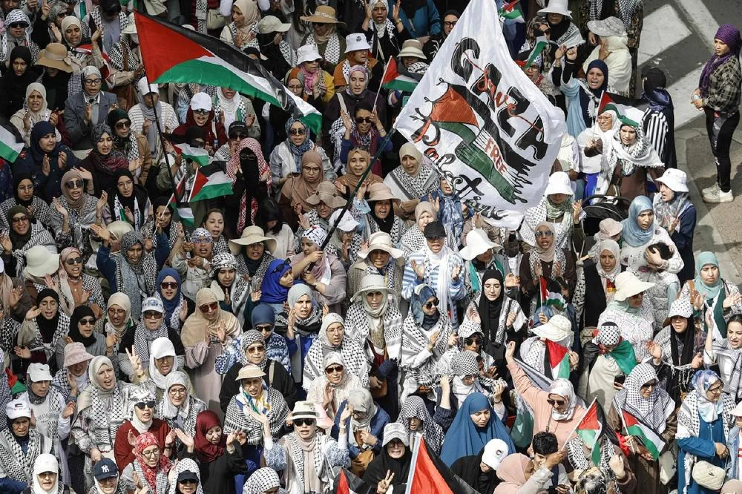 Moroccan protesters wave flags during a rally in support of the Palestinian people and against Israel's approval of a death penalty bill, in Rabat on April 19, 2026. (AFP) 