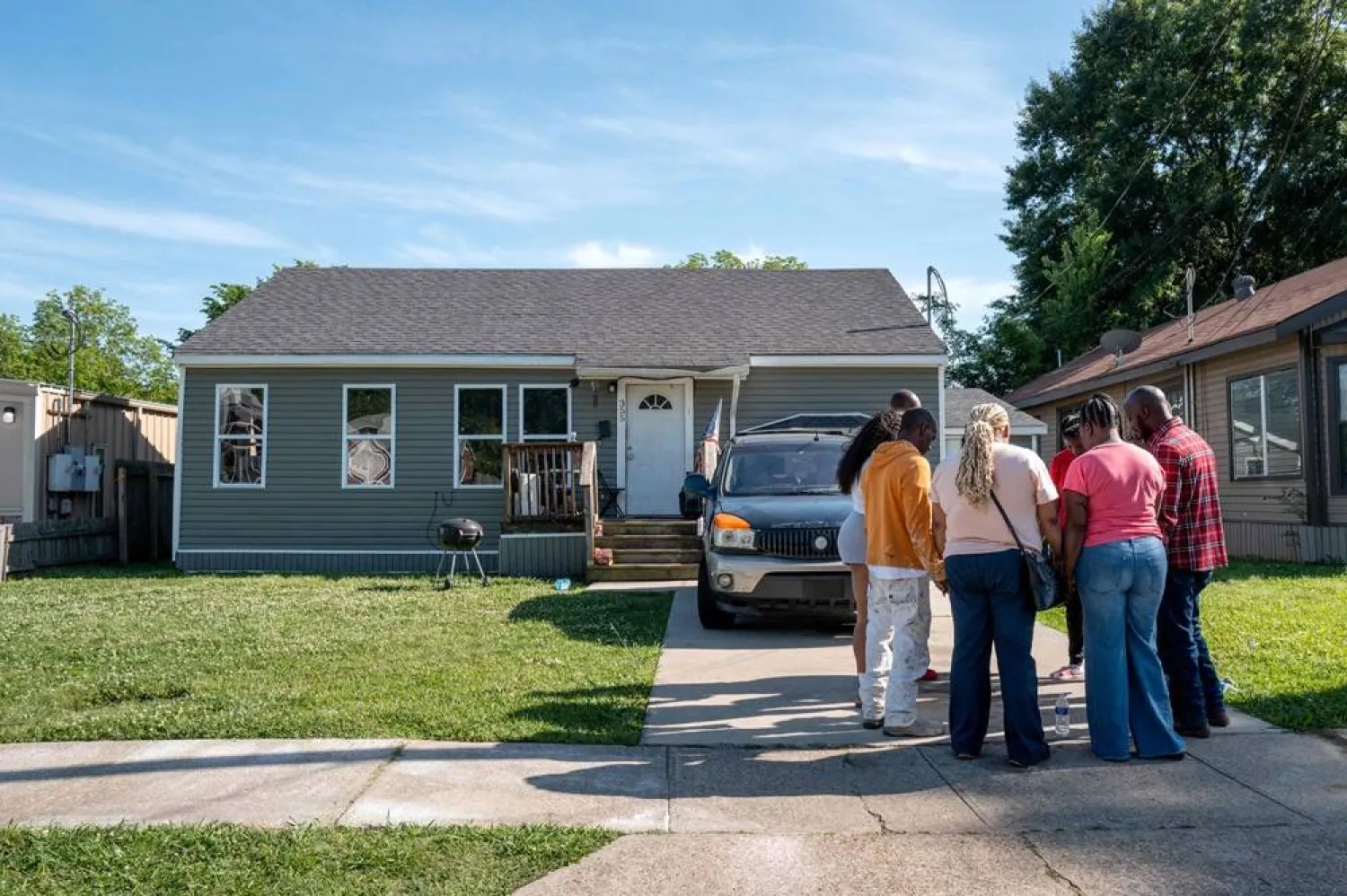 The Pugh and Elkins families gather while grieving the death of family members on April 19, 2026 in Shreveport, Louisiana. (Getty Images via AFP) 