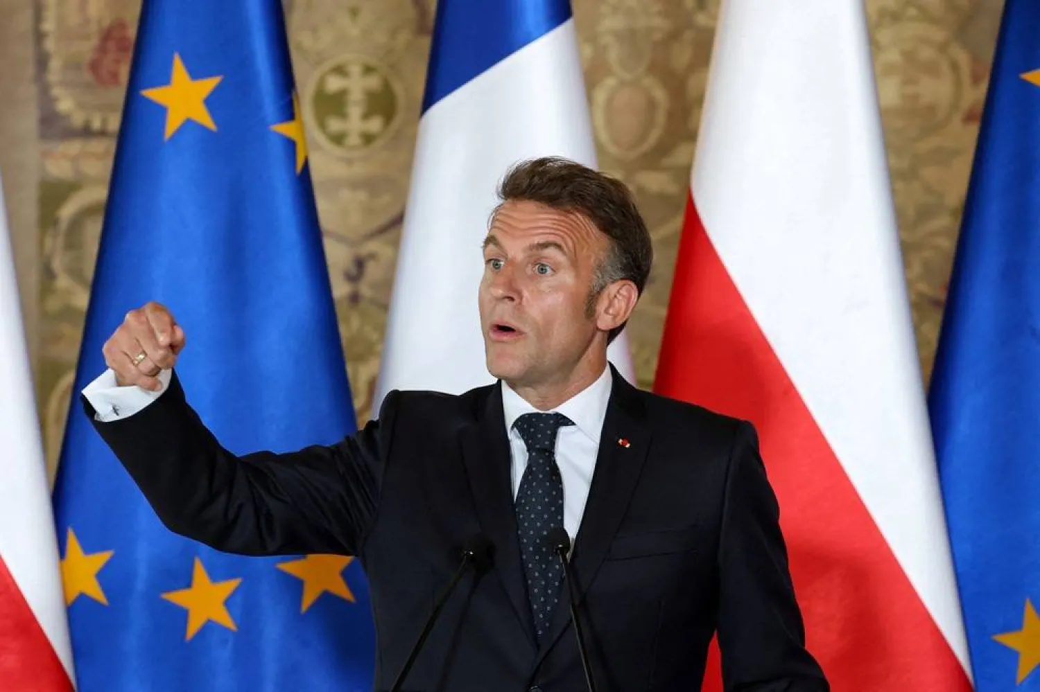  French President Emmanuel Macron gestures as he attends a joint press conference with Polish Prime Minister Donald Tusk in Gdansk, Poland, April 20, 2026. (Reuters)