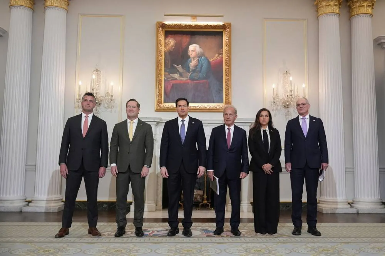 From left, Michael Needham, counselor for the US Dept. of State, US Ambassador to the United Nations Mike Waltz, Secretary of State Marco Rubio, US Ambassador to Lebanon Michel Issa, Lebanese Ambassador to the US Nada Hamadeh Moawad, and Israeli Ambassador to the US Yechiel Leiter pose for a photo before a meeting at the State Department in Washington, Tuesday, April 14, 2026. (AP) 