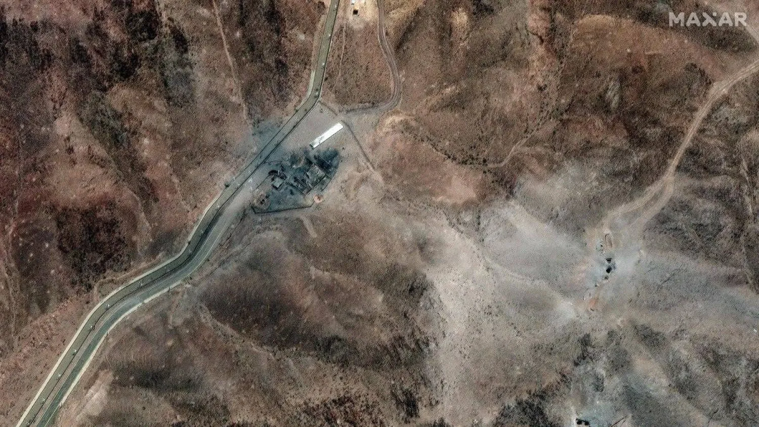 Airstrike craters are seen at the perimeter installation on Iran's Fordo Fuel Enrichment Plant (FFEP), Qom, Iran, June 24, 2025. (AFP)