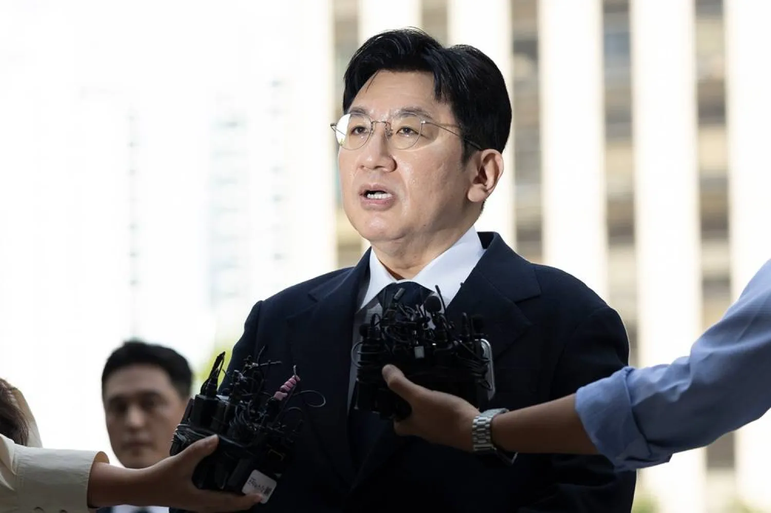 Bang Si-Hyuk, a chairman of HYBE answers reporters' question upon his arrival at the Seoul Metropolitan Police Agency in Seoul, South Korea, Monday, Sept. 15, 2025. (Kim Keun-soo/Newsis via AP) 