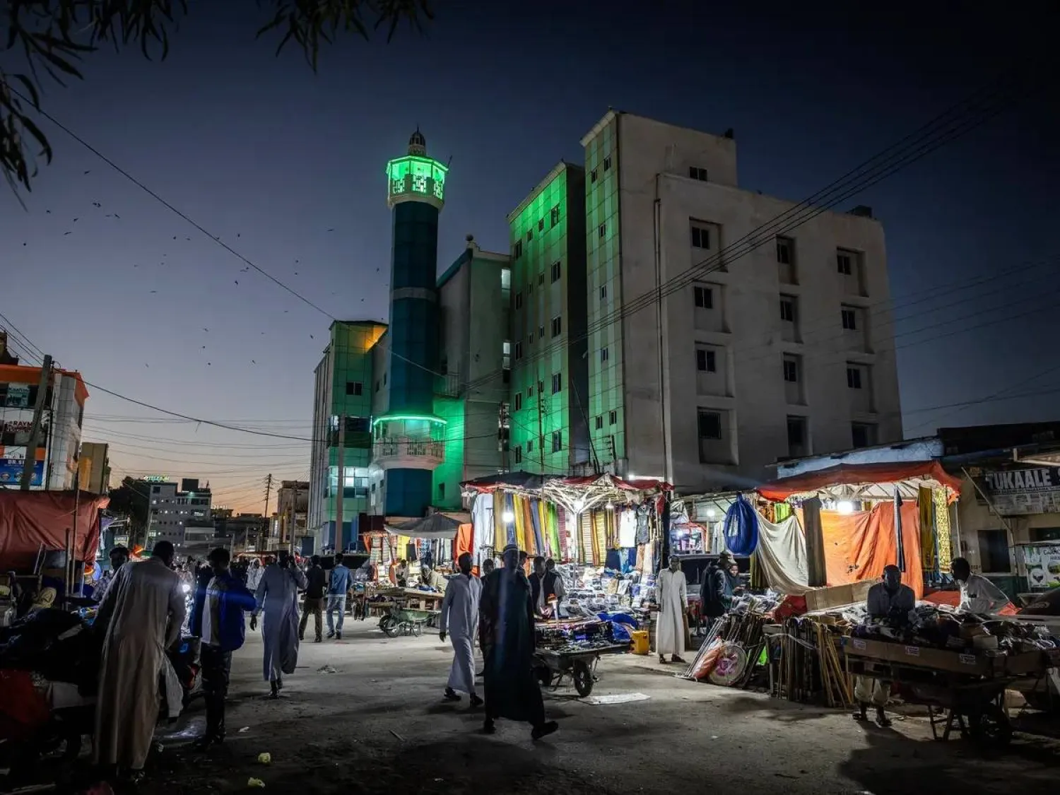 People walk past street stalls in front of a mosque in downtown Hargeisa. (AFP file)