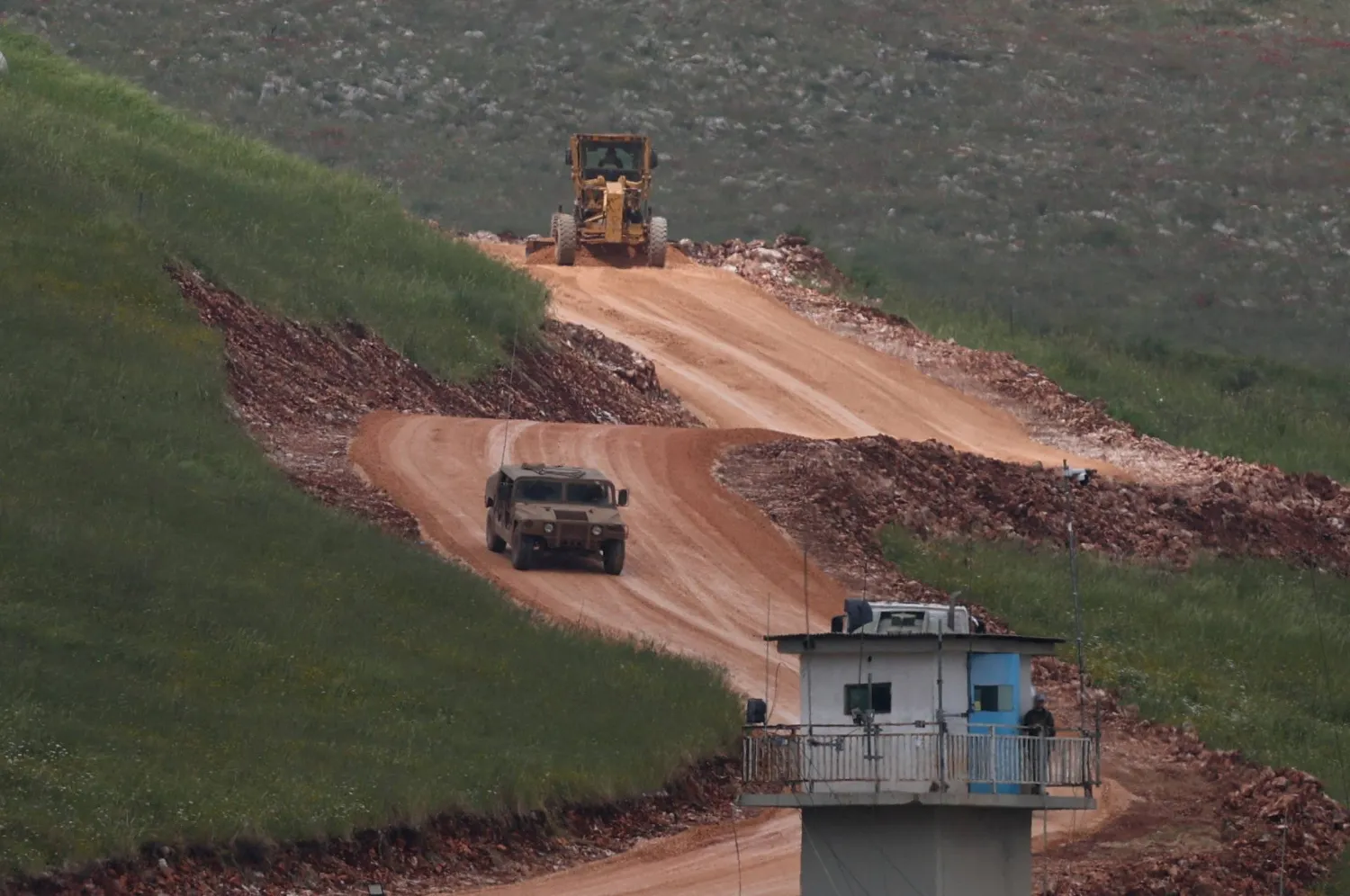  Israeli military vehicles drive in southern Lebanon, near the Israel-Lebanon border, amid a 10-day ceasefire between Lebanon and Israel, as seen from Israel, April 19, 2026. (Reuters)