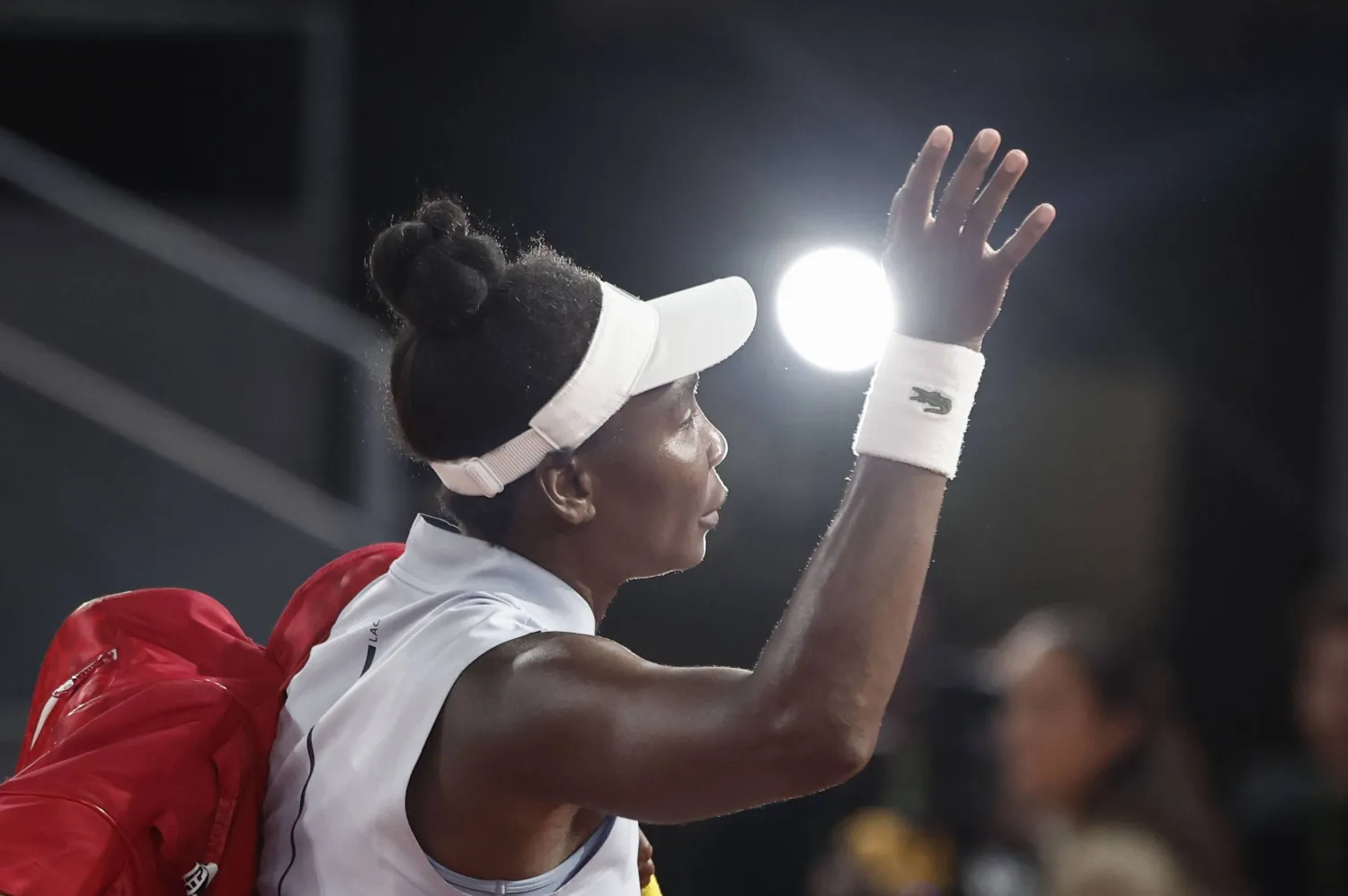 Venus Williams of USA waves as she leaves court after losing her first round match against Kaitlin Quevedo of Spain at the Madrid Open tennis tournament in Madrid, Spain, 21 April 2026.  EPA/SERGIO PEREZ