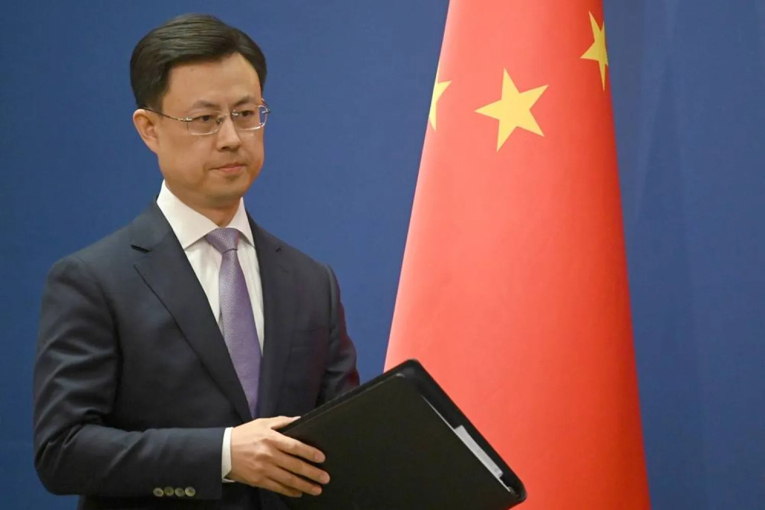  13 April 2026, China, Beijing: Guo Jiakun, spokesman for the Chinese Foreign Ministry, speaks to journalists. (dpa)