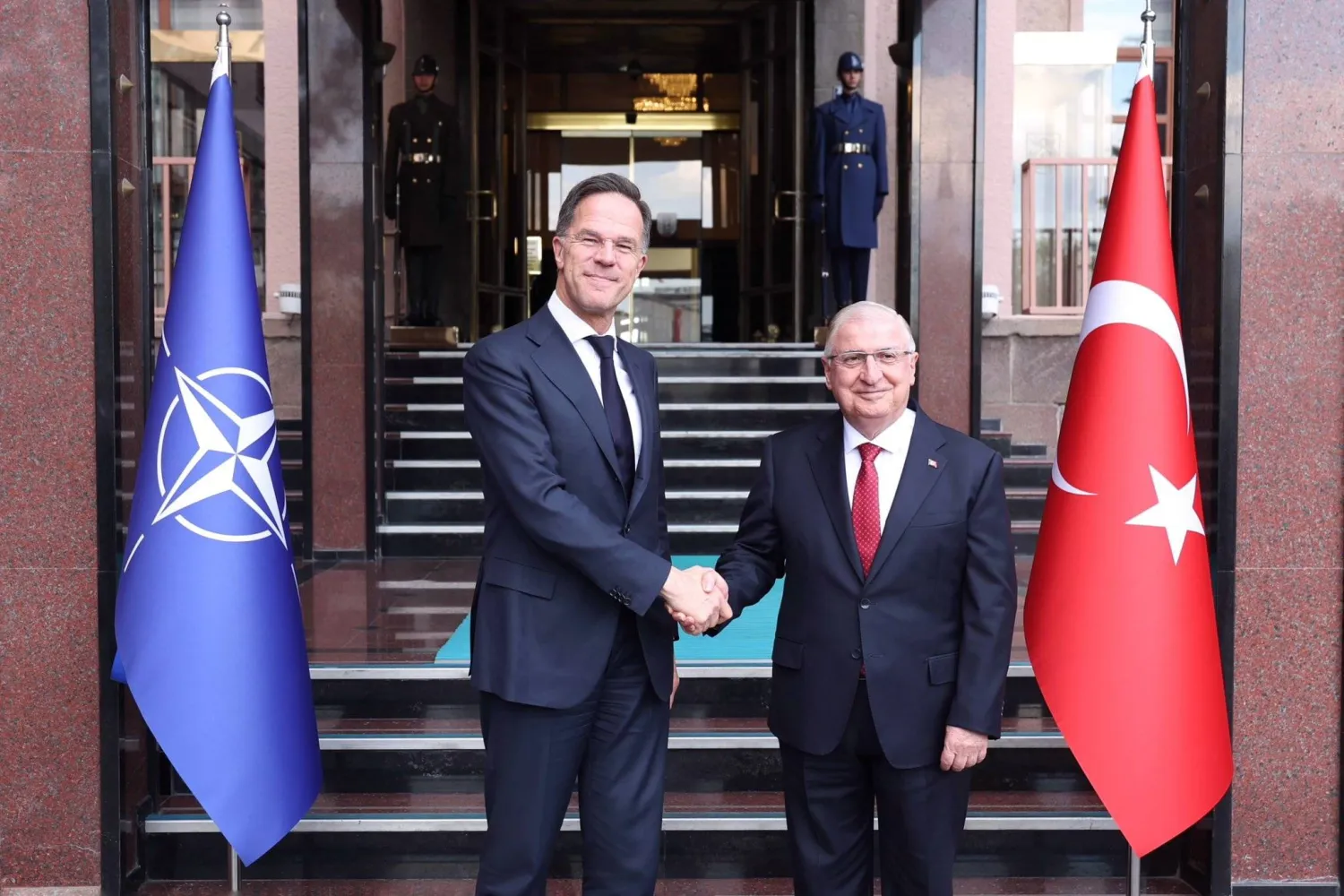 A handout photo made available by the Turkish Defense Ministry Press Office shows Turkish Defense Minister Yasar Guler (R) and North Atlantic Treaty Organization (NATO) Secretary General Mark Rutte (L) shaking hands during a meeting in Ankara, Türkiye, 21 April 2026. (EPA/Turkish Defense Ministry/Handout) 