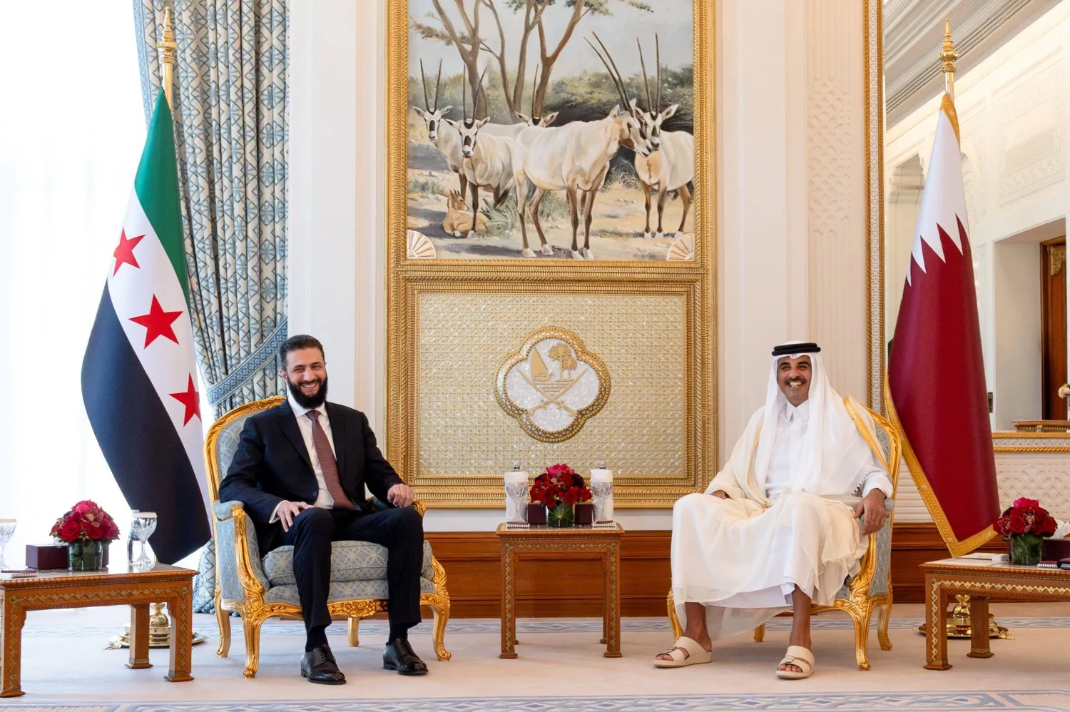 Emir of Qatar Sheikh Tamim bin Hamad Al Thani meets Syrian President Ahmed Al-Sharaa in Doha, Qatar, April 22, 2026. (Amiri Diwan/Handout via Reuters)