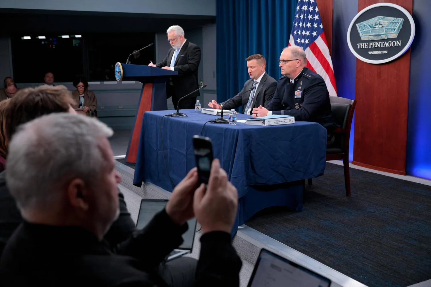 ARLINGTON, VIRGINIA - APRIL 21: Under Secretary of War Jules Hurst III (C) and Director of Force Structures Lt. Gen. Steven Whitney (R) hold a press briefing to discuss the Department of War's FY27 budget request at the Pentagon on April 21, 2026 in Arlington, Virginia. Chip Somodevilla/Getty Images/AFP 