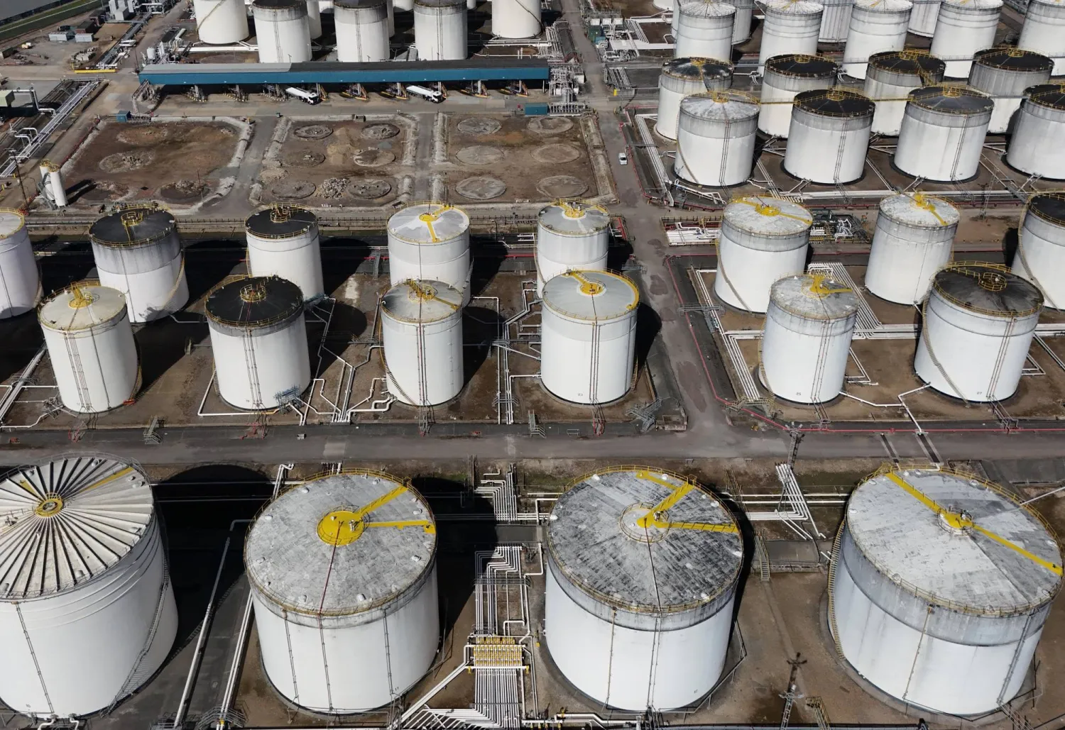 An image made with a drone shows oil gas and fuel storage units at the Navigator Terminal in Grays, Britain, 14 April 2026. EPA/NEIL HALL