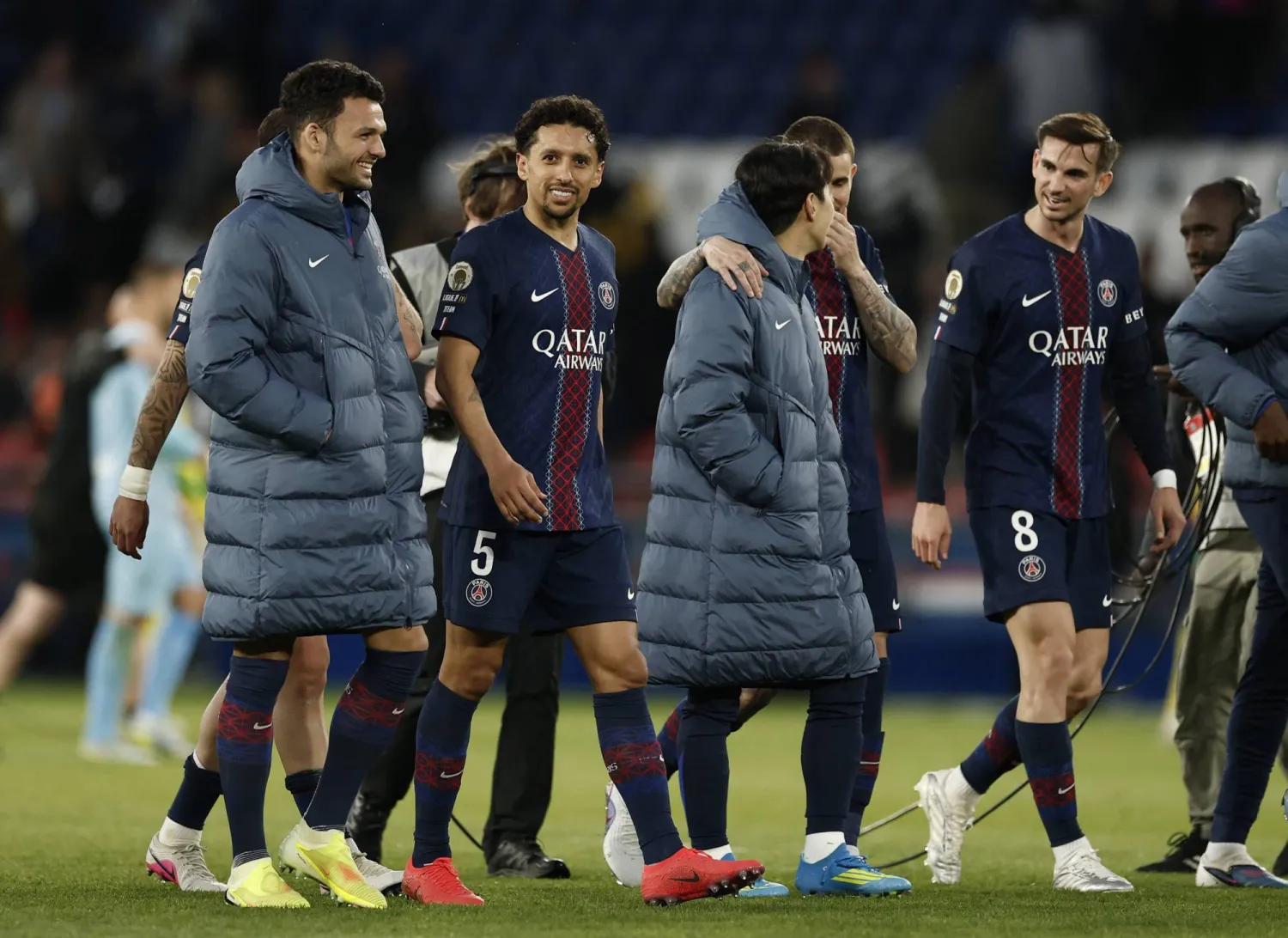 Soccer Football - Ligue 1 - Paris St Germain v FC Nantes - Parc des Princes, Paris, France - April 22, 2026 Paris St Germain's Marquinhos, Goncalo Ramos and Fabian Ruiz celebrate after the match REUTERS/Benoit Tessier