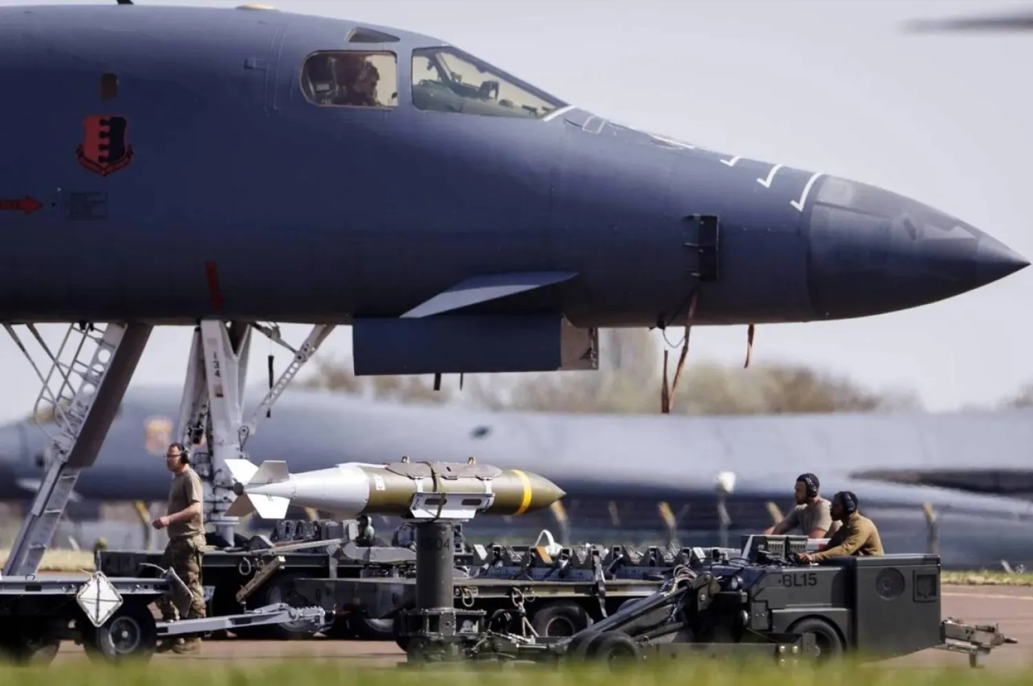 US Air Force personnel perform maintenance on bomber at UK's RAF Fairford (EPA)