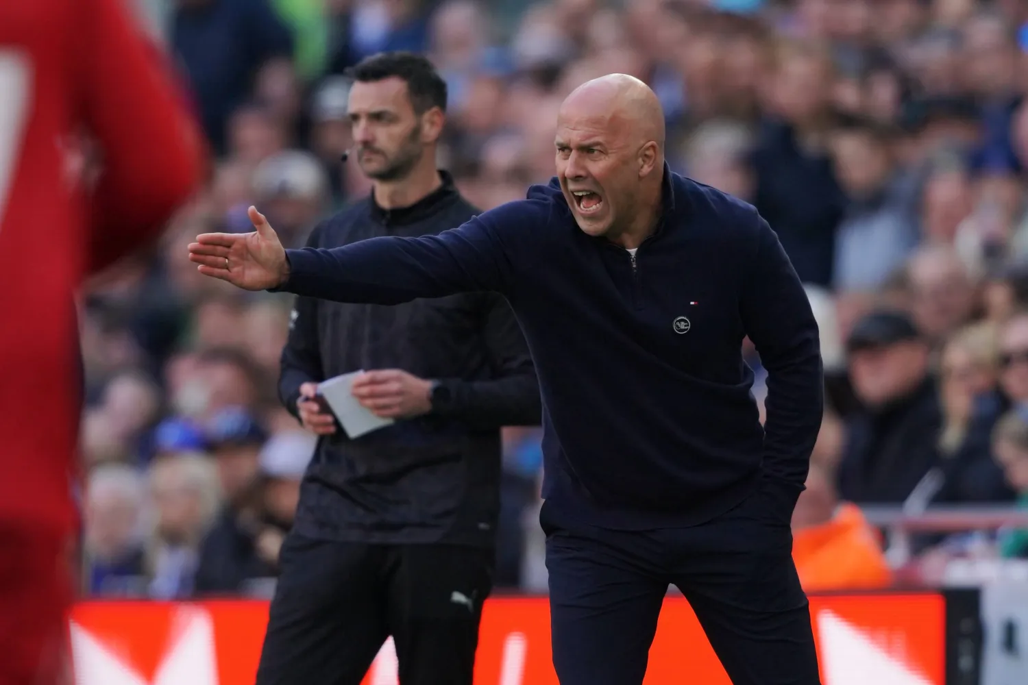 Liverpool's manager Arne Slot reacts during the English Premier League soccer match between Everton and Liverpool in Liverpool, England, Sunday, April 19, 2026. (AP Photo/Ian Hodgson)
