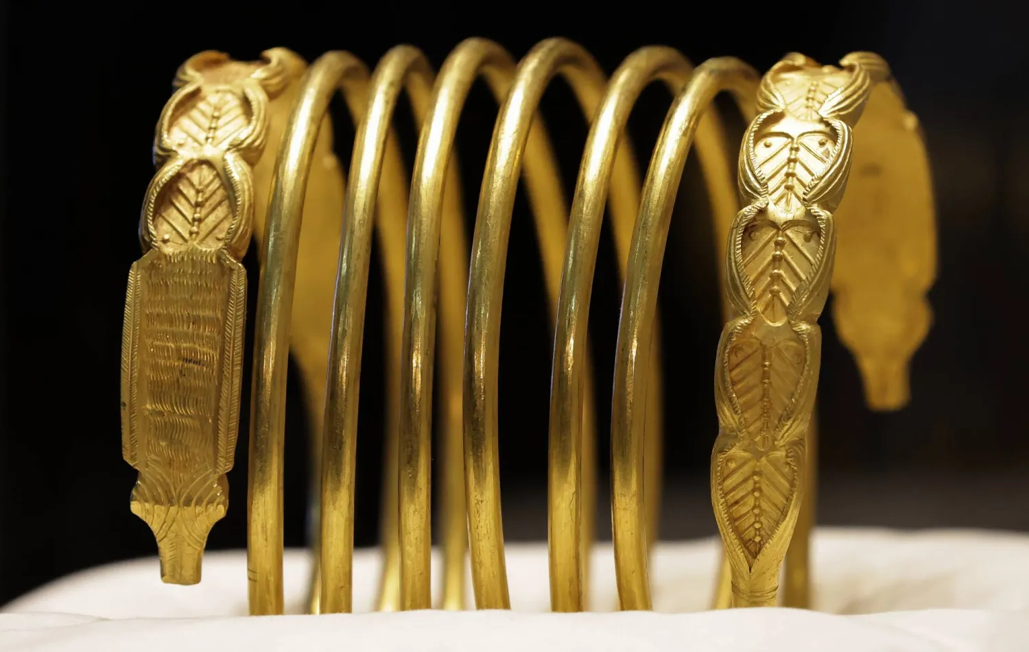 One of two gold bracelets is displayed during a media presentation at the National History Museum of Romania in Bucharest, Romania, 21 April 2026.EPA/ROBERT GHEMENT