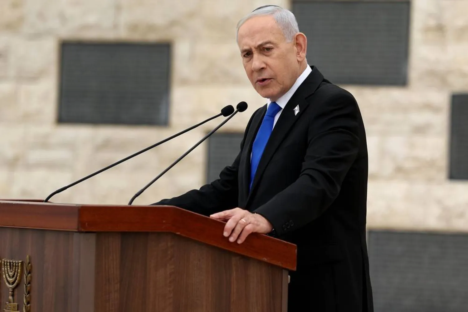  Israel's Prime Minister Benjamin Netanyahu attends a ceremony commemorating Israel's Remembrance Day for fallen soldiers, or Yom HaZikaron, at the Military Cemetery on Mount Herzl in Jerusalem, Tuesday April 21, 2026. (Ilia Yefimovich/Pool Photo via AP) 