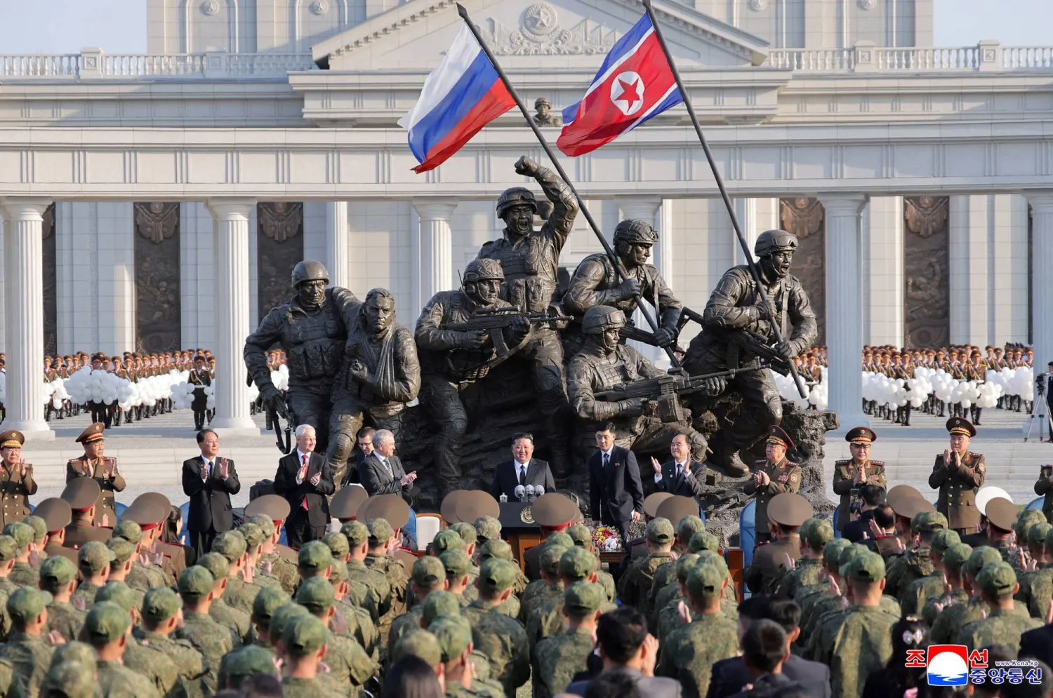 Russia's Defense Minister Andrey Belousov and Russia's State Duma Chairman Vyacheslav Volodin clap as North Korean leader Kim Jong Un speaks during the opening ceremony of the Memorial Museum of Combat Feats at the Overseas Military Operations honoring North Korean troops killed while fighting for Russia in the war against Ukraine, in Pyongyang, North Korea, April 26, 2026, in this picture released by North Korea's official Korean Central News Agency. (KCNA via Reuters)