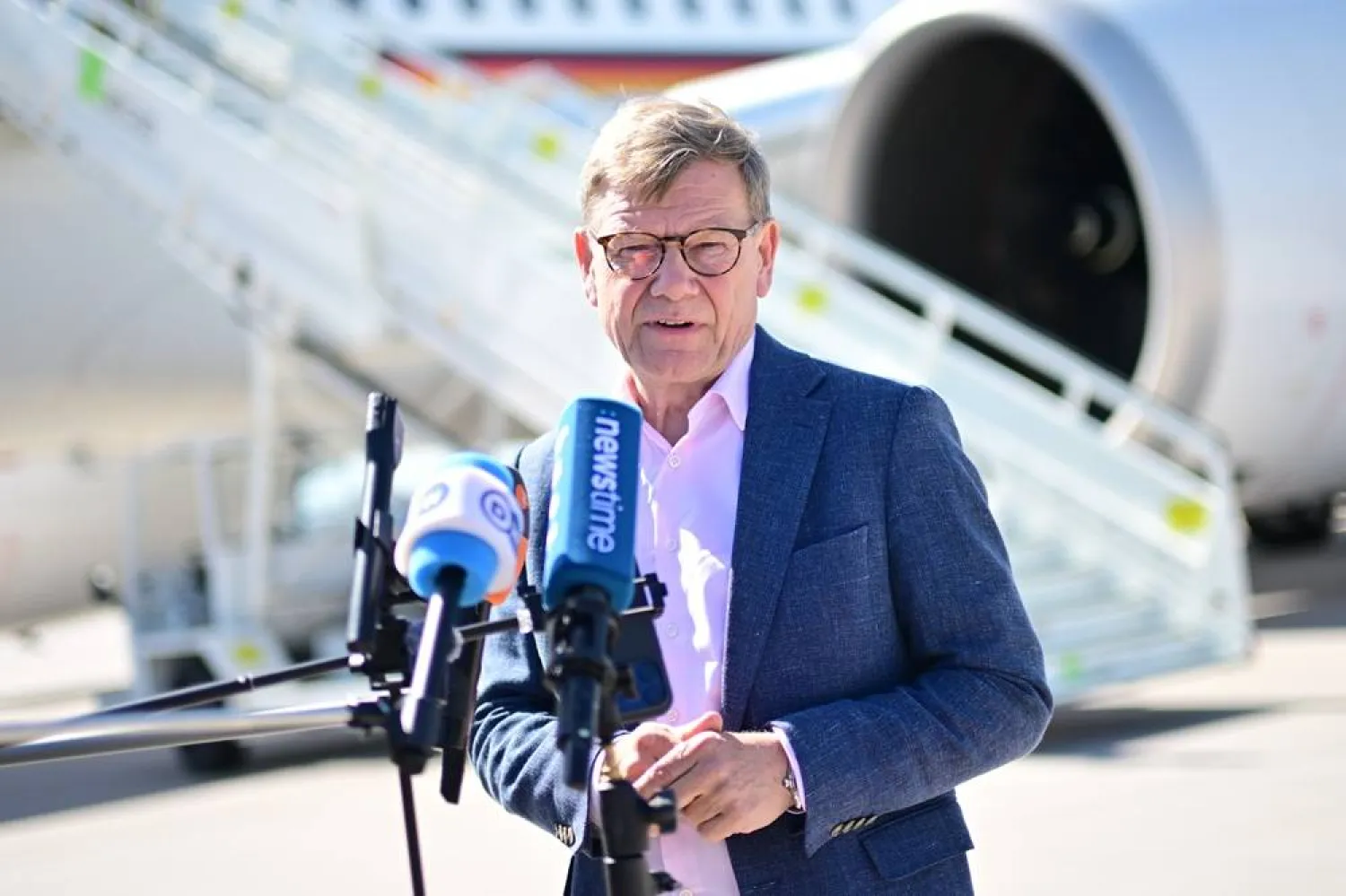  27 April 2026, Berlin: Johann Wadephul, German Foreign Minister, gives a statement on the military section of Berlin Brandenburg Airport on an aircraft of the air force before his departure to the United Nations in New York. (dpa)