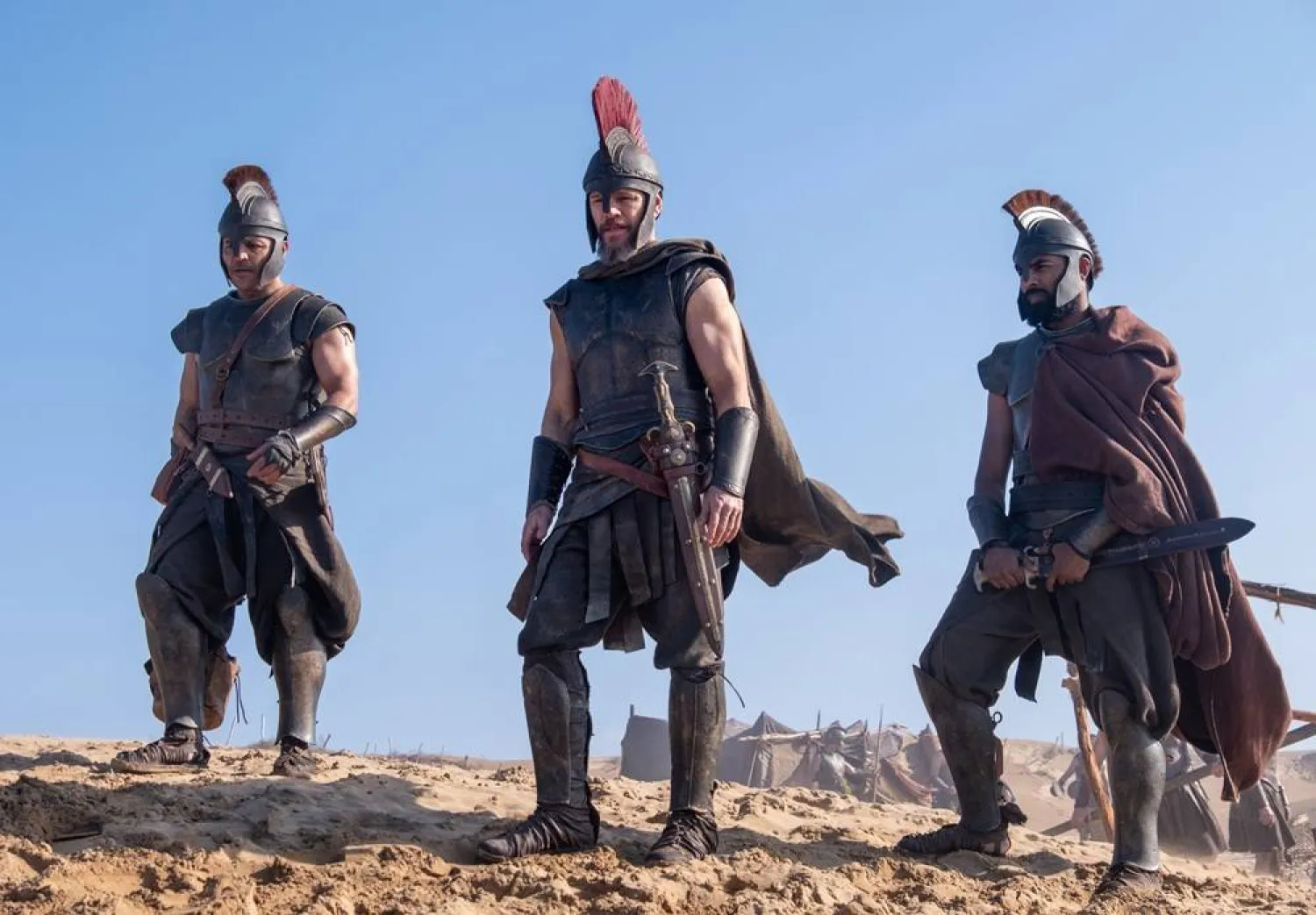 This image released by Universal Pictures shows, from left, Jimmy Gonzales ia Cepheus, Matt Damon as Odysseus and Himesh Patel as Eurylochus in a scene from "The Odyssey." (Melinda Sue Gordon/Universal Pictures via AP) 