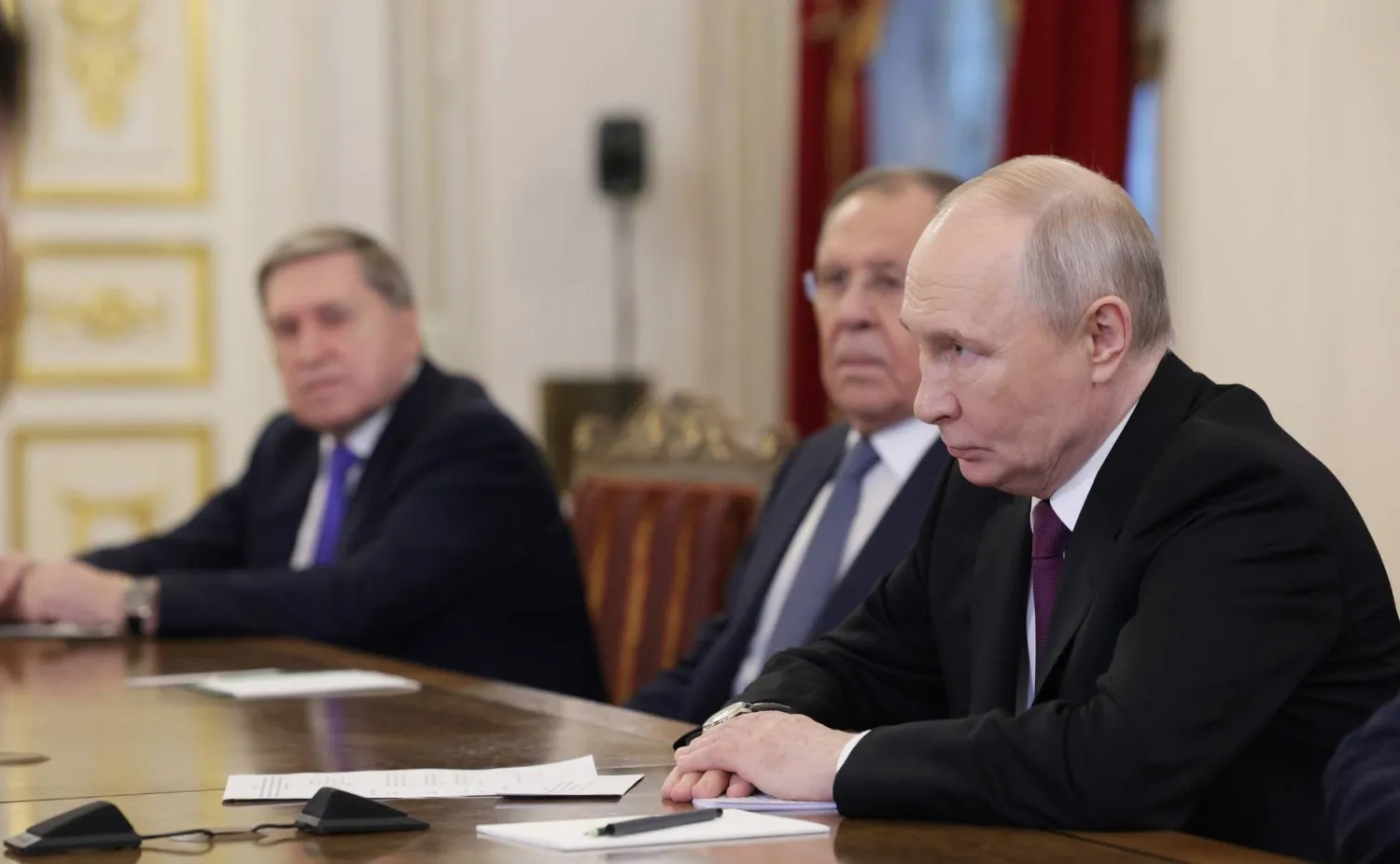 27 April 2026, Russia, Saint Petersburg: Russian President Vladimir Putin (R) meets with Iranian Foreign Minister Abbas Araghchi in Saint Petersburg. (Kremlin/dpa)
