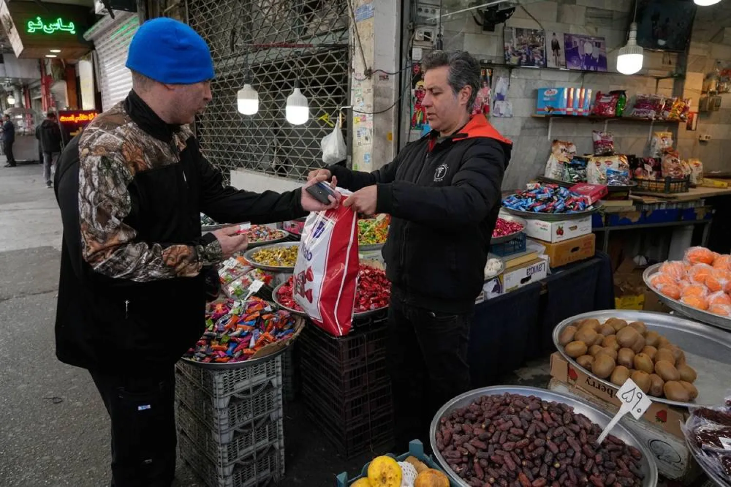 People conduct their businesses around the traditional grand bazaar of Tehran, Iran, March 29, 2026. (AP)