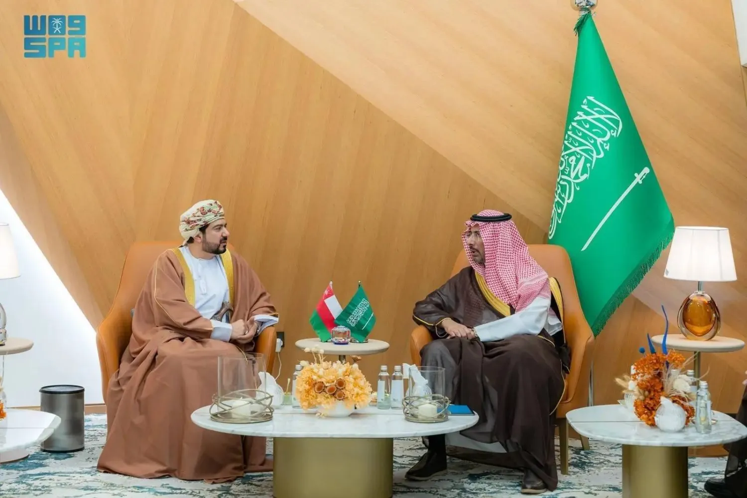 Saudi Minister of Industry and Mineral Resources Bandar Alkhorayef and President of Oman's Public Authority for Special Economic Zones and Free Zones Qais Al-Yousef meet in Riyadh on Monday. (SPA)