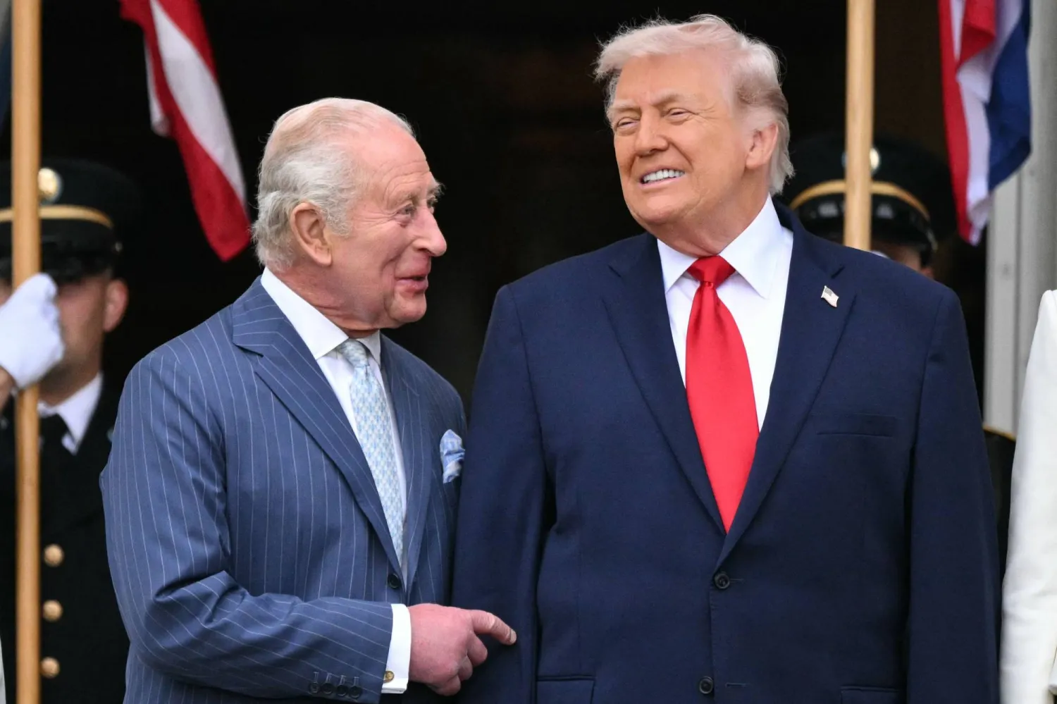 US President Donald Trump speaks with Britain's King Charles III during an arrival ceremony on the South Lawn of the White House in Washington, DC, on April 28, 2026. (AFP)