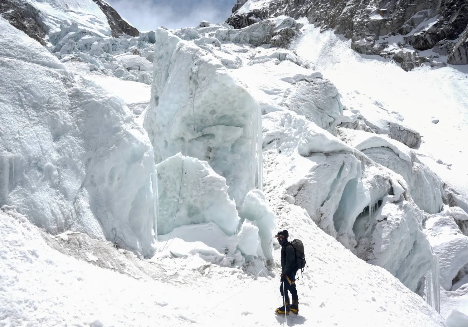 A member of expedition team stands at Khumbu Icefall in Solukhumbu district, also known as the Everest region, Nepal, April 22, 2026. REUTERS/Purnima Shrestha