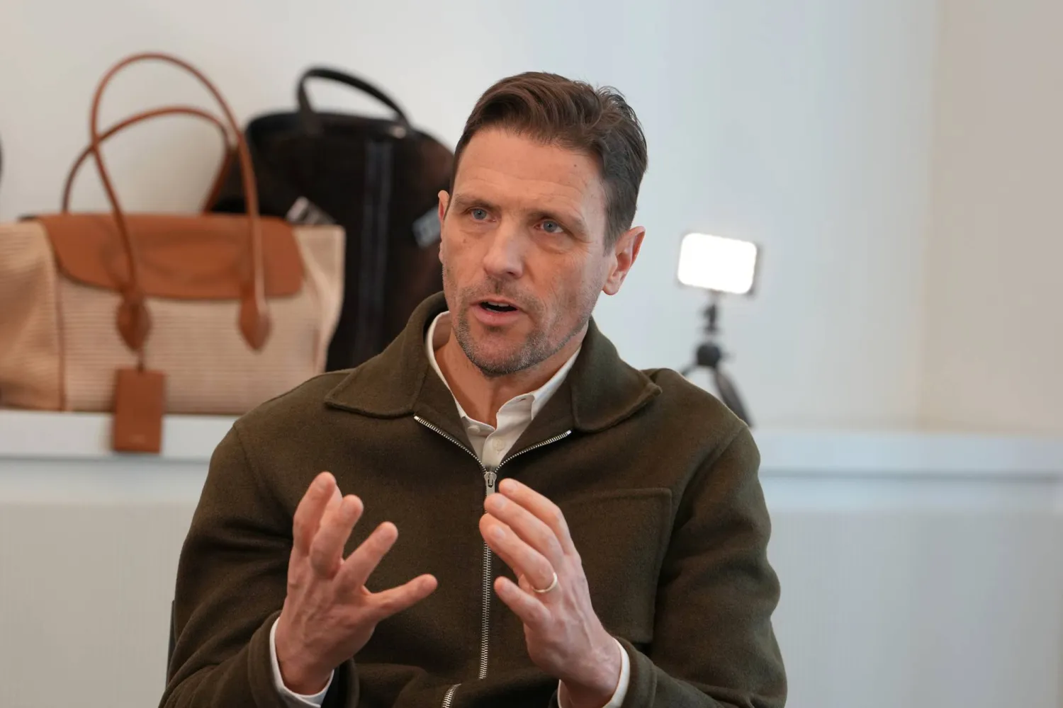 James Ferragamo, a chief product officer for the Salvatore Ferragamo group, talks with journalists during an interview with the Associated Press, in Milan, Italy, Wednesday, April 22, 2026. (AP Photo/Antonio Calanni) 