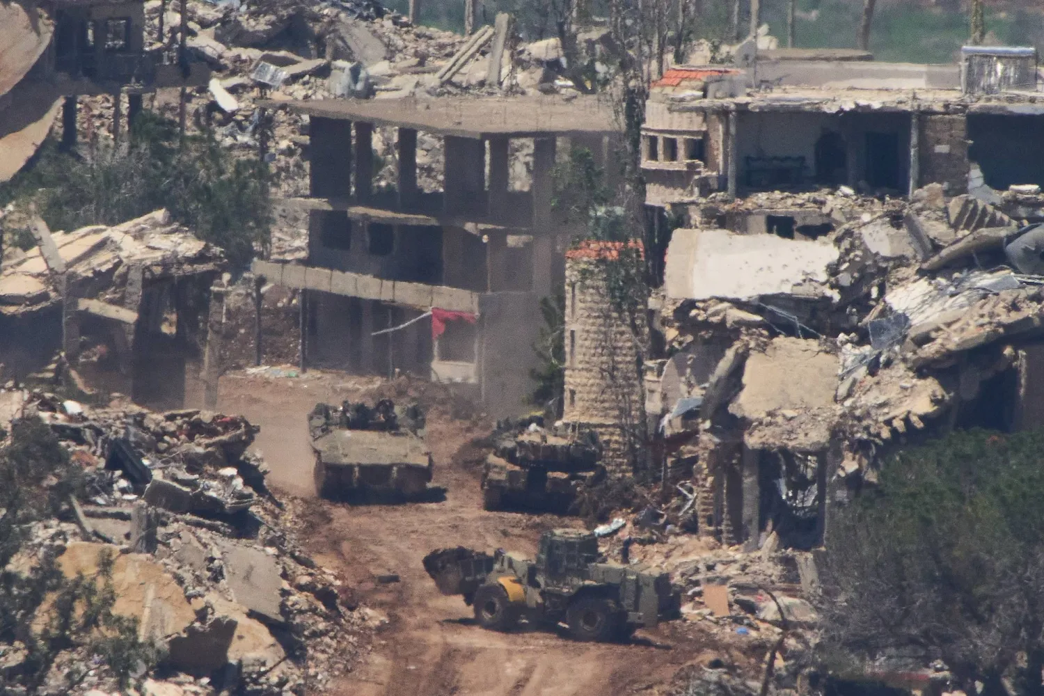 Israeli soldiers operate in southern Lebanon, as seen from northern Israel, Wednesday, April 29, 2026. (AP Photo/Ariel Schalit)