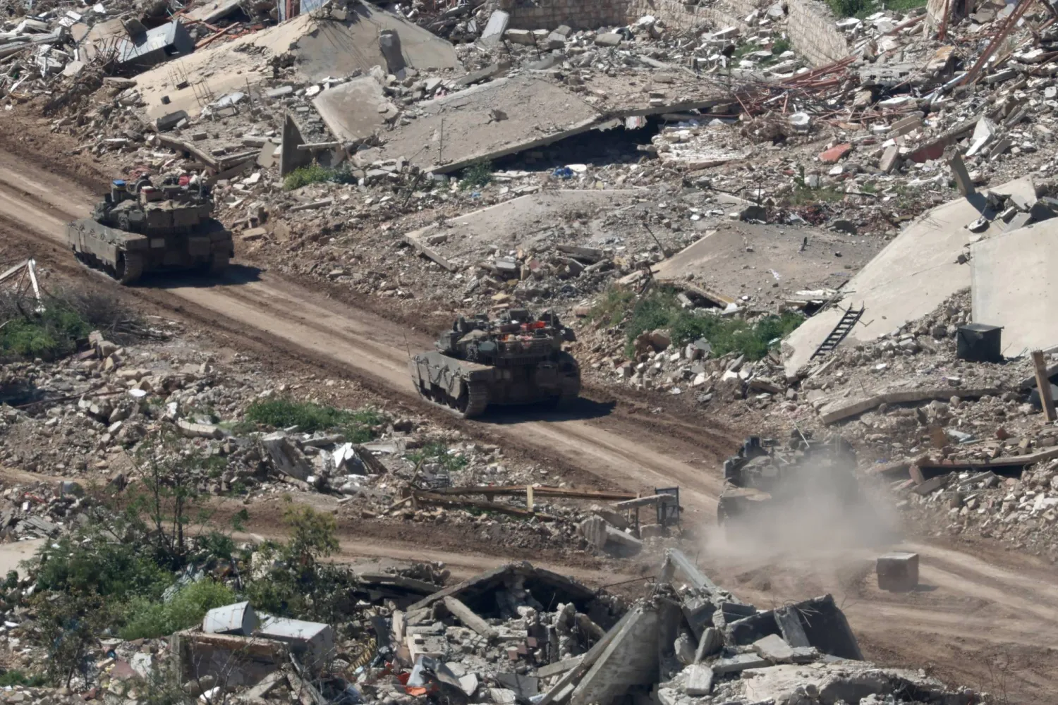 Israeli military vehicles maneuver on the Lebanese side of the border, as seen from the Upper Galilee in northern Israel, 29 April 2026, amid a ceasefire between Israel and Lebanon.  EPA/ATEF SAFADI