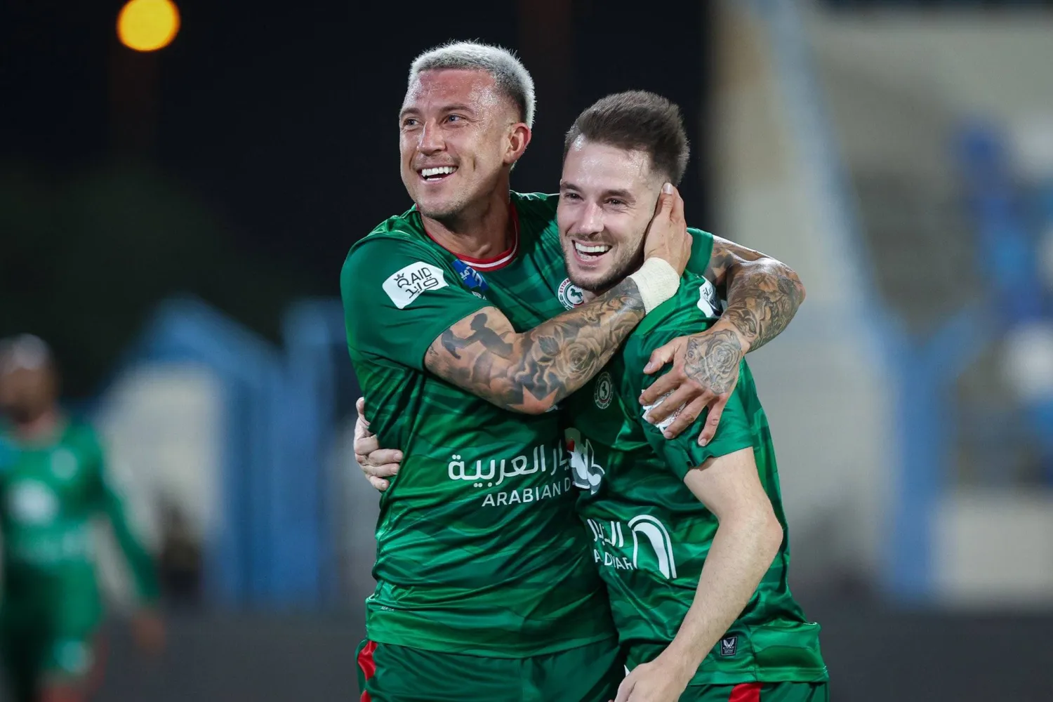 ميدران لاعب الاتفاق محتفلاً بهدفه في الأخدود (موقع النادي)