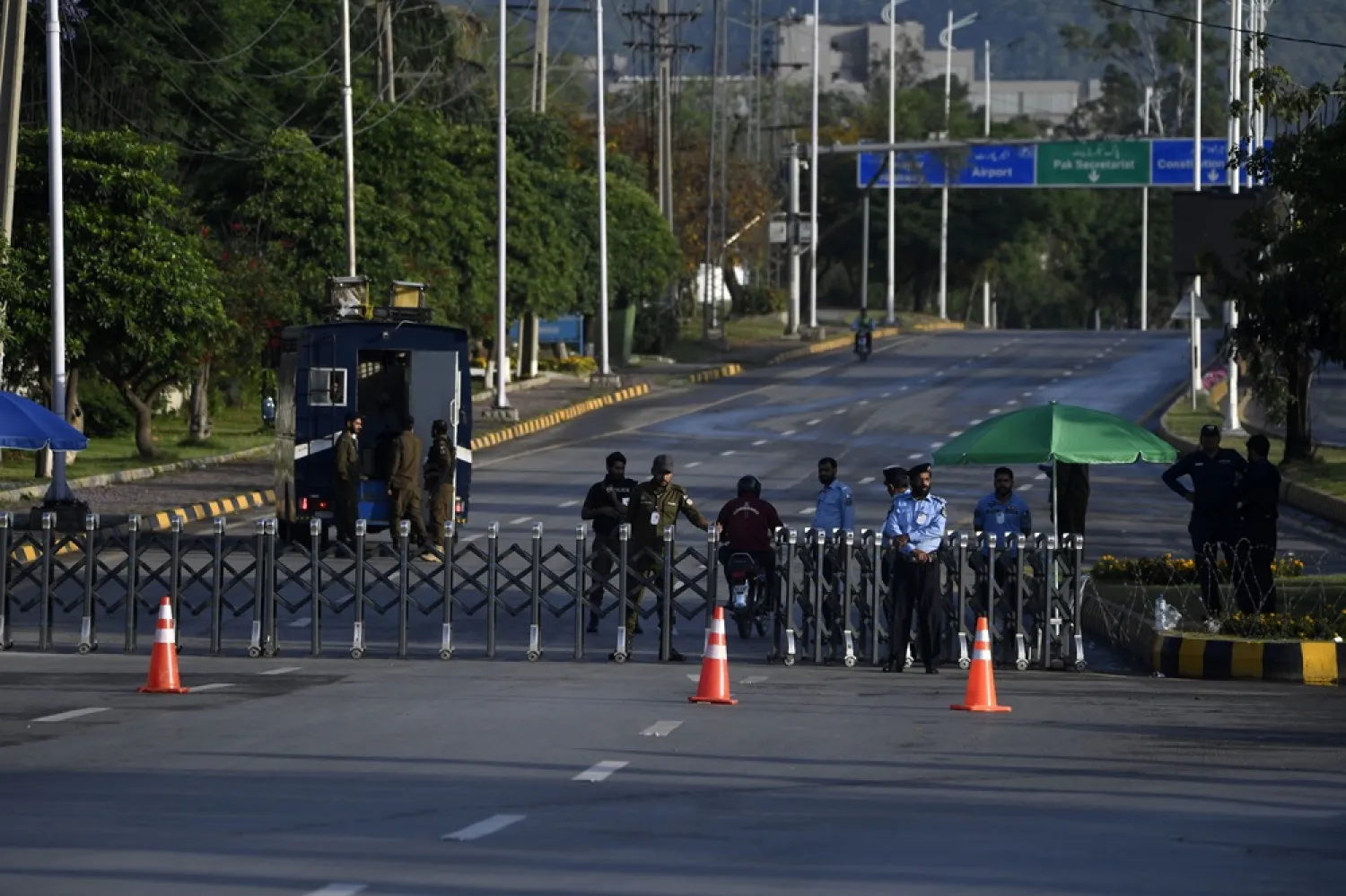 Pakistani security officials stand guard at a checkpoint amid a high-level security lockdown ahead of anticipated US-Iran peace talks in Islamabad, Pakistan, 25 April 2026. (EPA) 