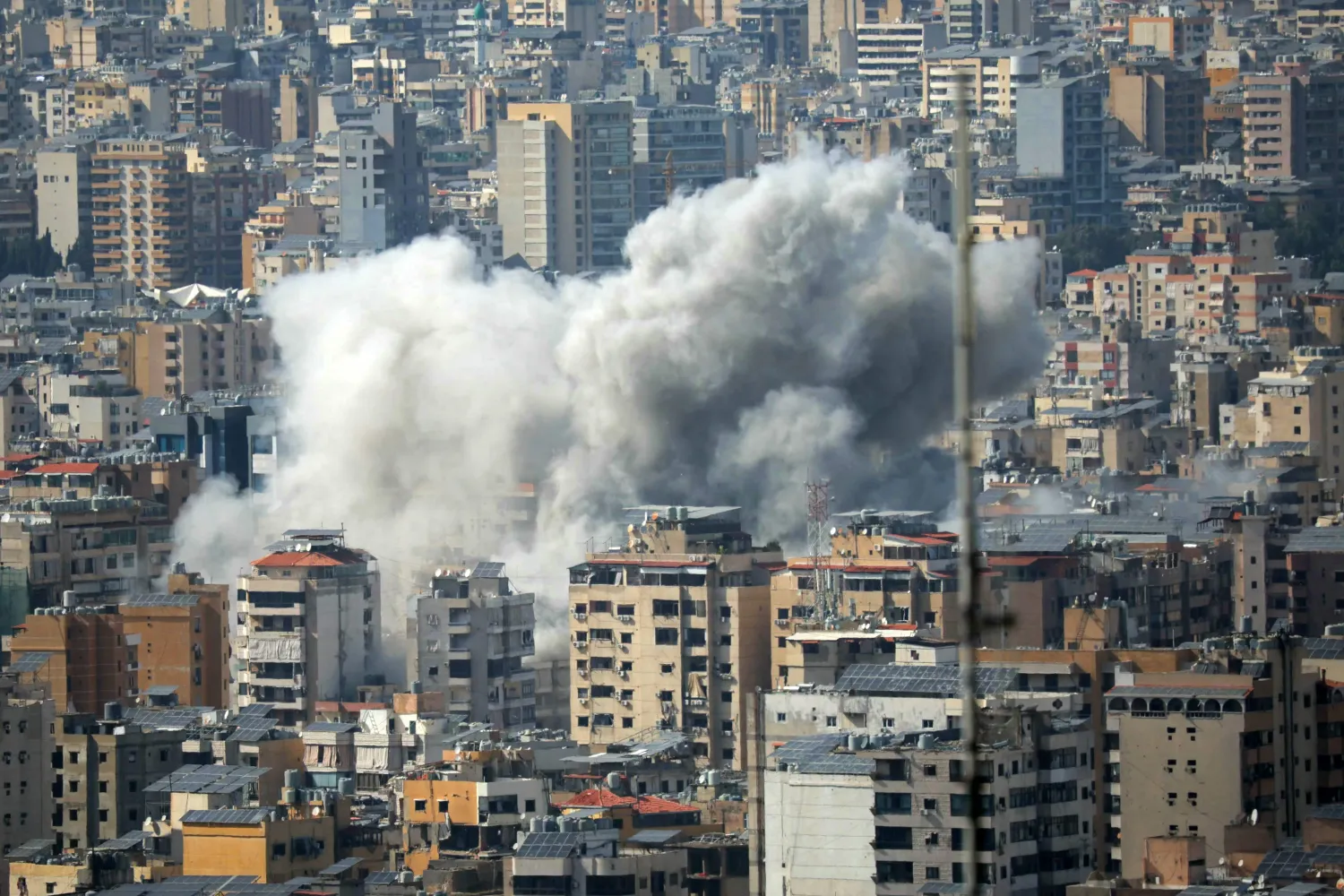 Smoke rises from the site of an Israeli strike in Beirut's southern suburbs, on April 5, 2026. (AFP)