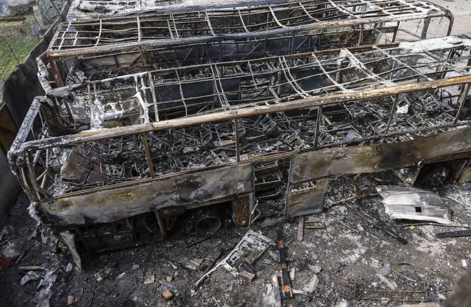 Burned buses following a Russian strike on a residential area in Odesa, southwestern Ukraine, 30 April 2026. (EPA)