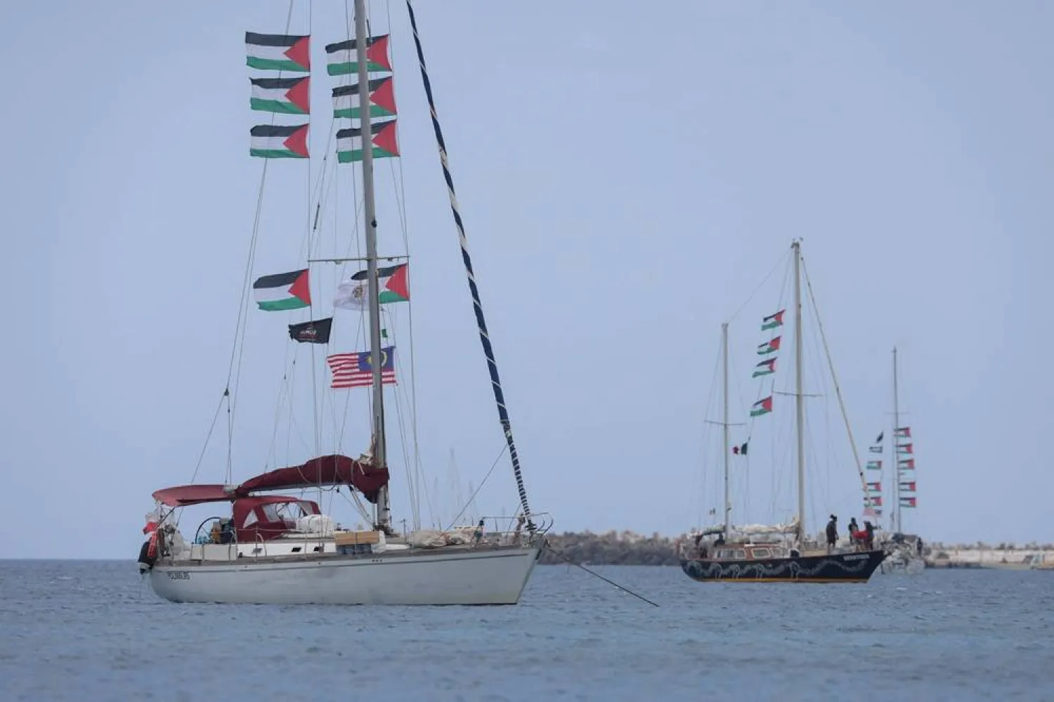 Vessels of the Global Sumud Flotilla, which was intercepted on international waters by the Israeli Navy, sail off the city of Ierapetra, on the island of Crete, Greece, May 1, 2026. (Reuters)