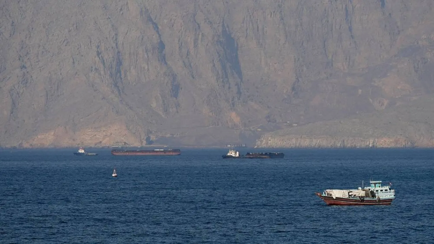 Ships and tankers in the Strait of Hormuz off the coast of Musandam, Oman, April 18, 2026. (Reuters)