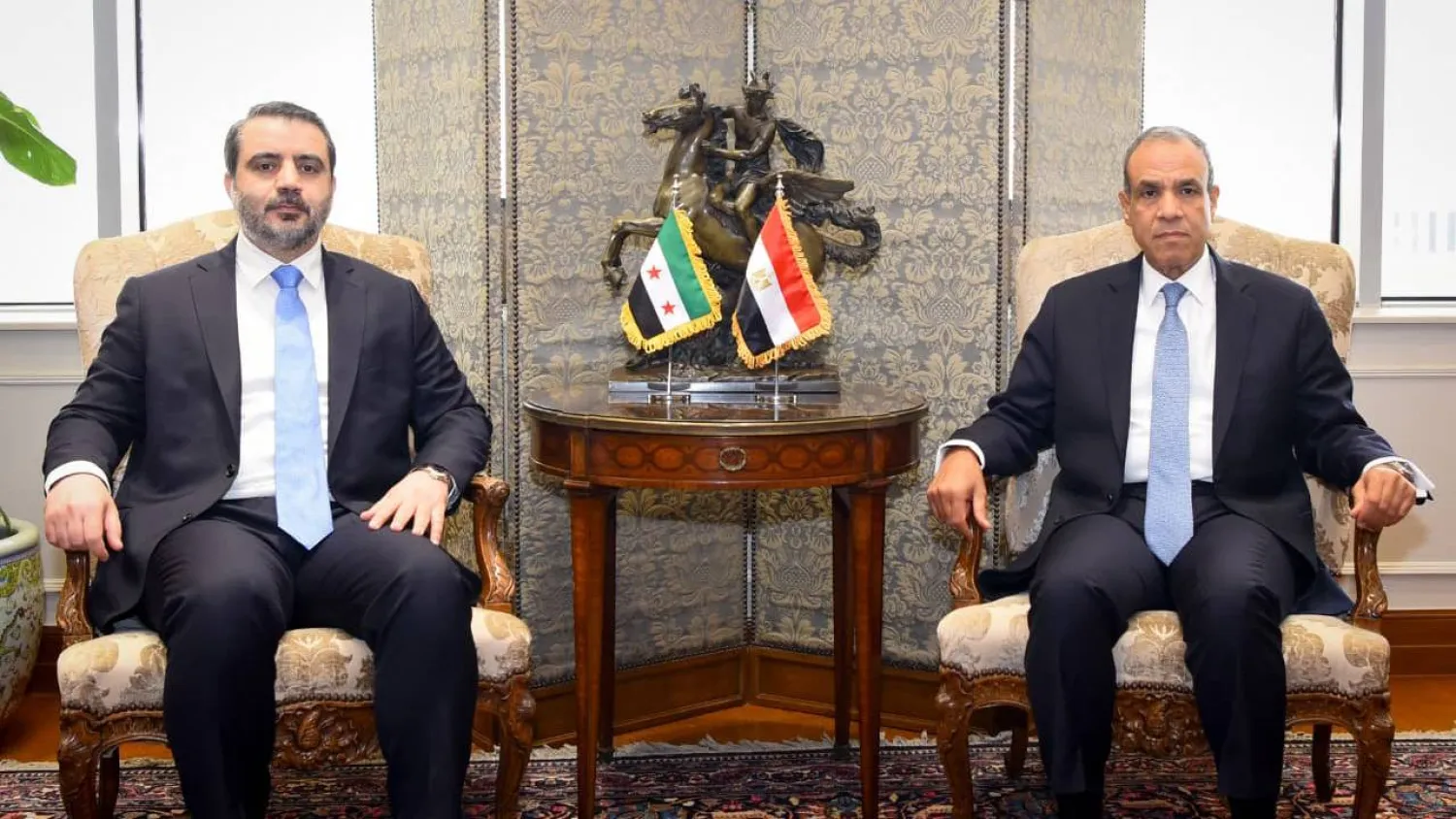 A handout picture released by Egypt's Foreign Ministry on May 3, 2026 shows Egyptian Foreign Minister Badr Abdelatty, meeting with his Syrian counterpart Asaad al-Shaibani (L), in the new administrative capital of Cairo. (Egyptian Foreign Ministry / AFP)