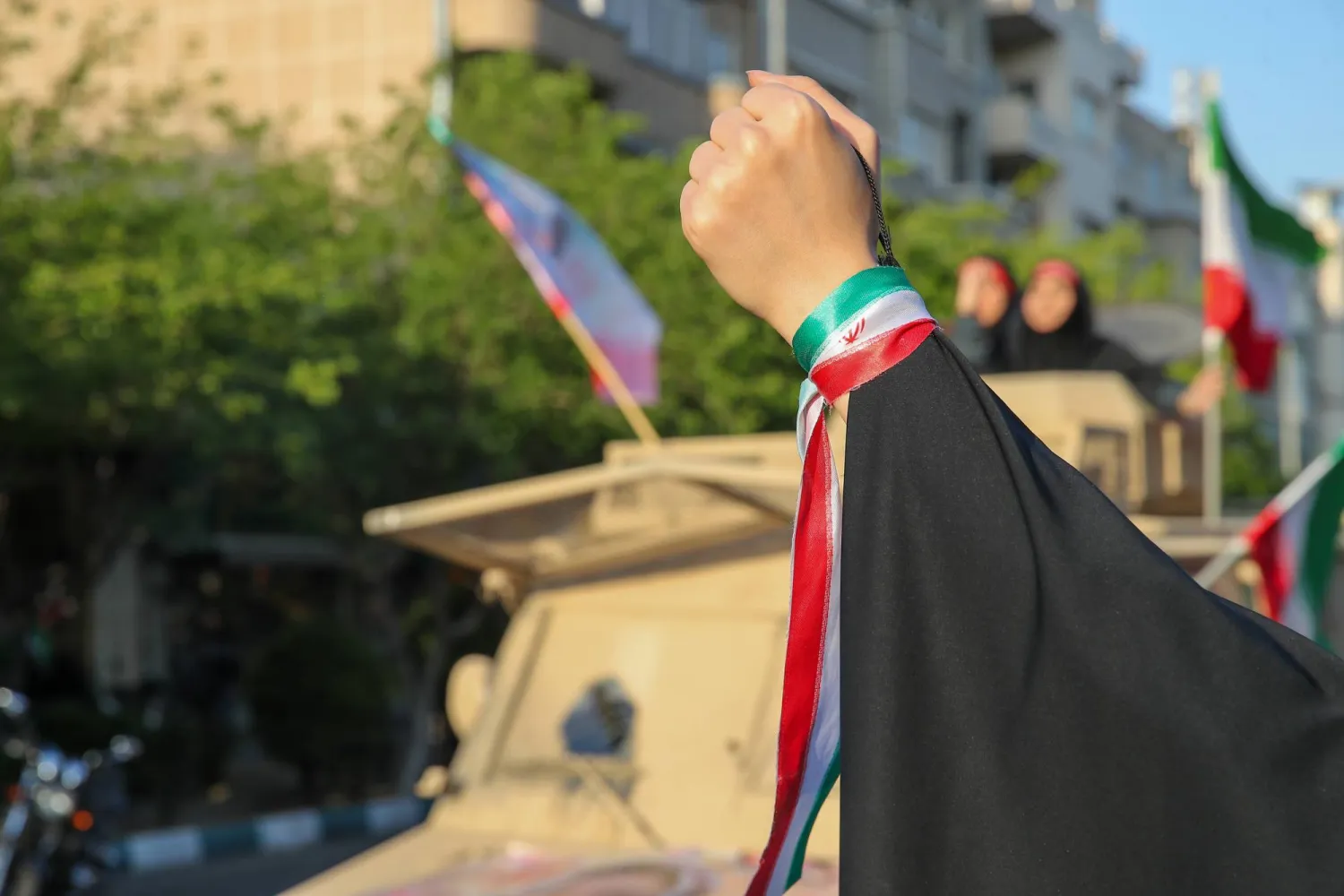 FILED - 17 April 2026, Iran, Tehran: FILE PHOTO - An Iranian woman takes part in a rally under the motto "Sacrificed Girls" to pay tribute to women killed during the war. Photo: Stringer/dpa
