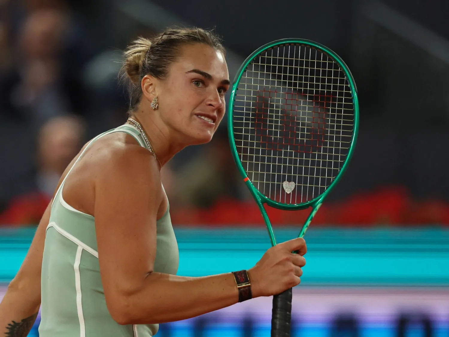Tennis - Madrid Open - Park Manzanares, Madrid, Spain - April 28, 2026 Belarus' Aryna Sabalenka reacts during her quarterfinal match against Hailey Baptiste of the US. (Reuters)