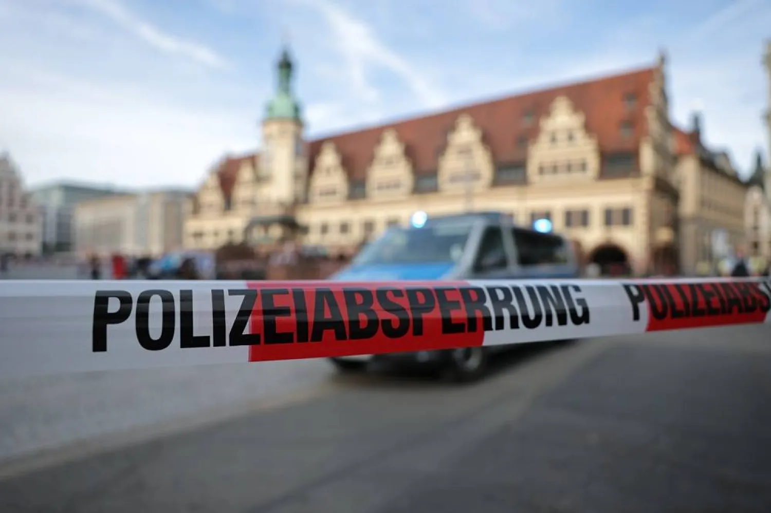  04 May 2026, Saxony, Leipzig: A police car is parked behind a police cordon at the spot where a car has driven into a group of people in Leipzig. (dpa)