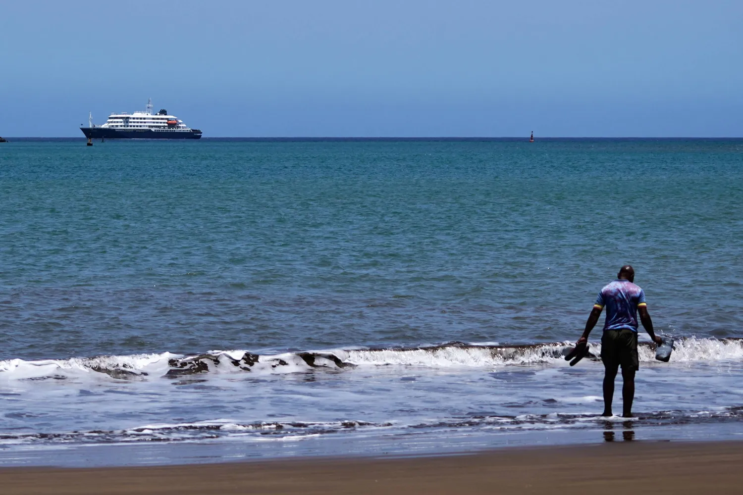 The MV Hondius cruise ship is anchored at a port in Praia, Cape Verde, Monday, May 4, 2026. (AP Photo/Arilson Almeida)