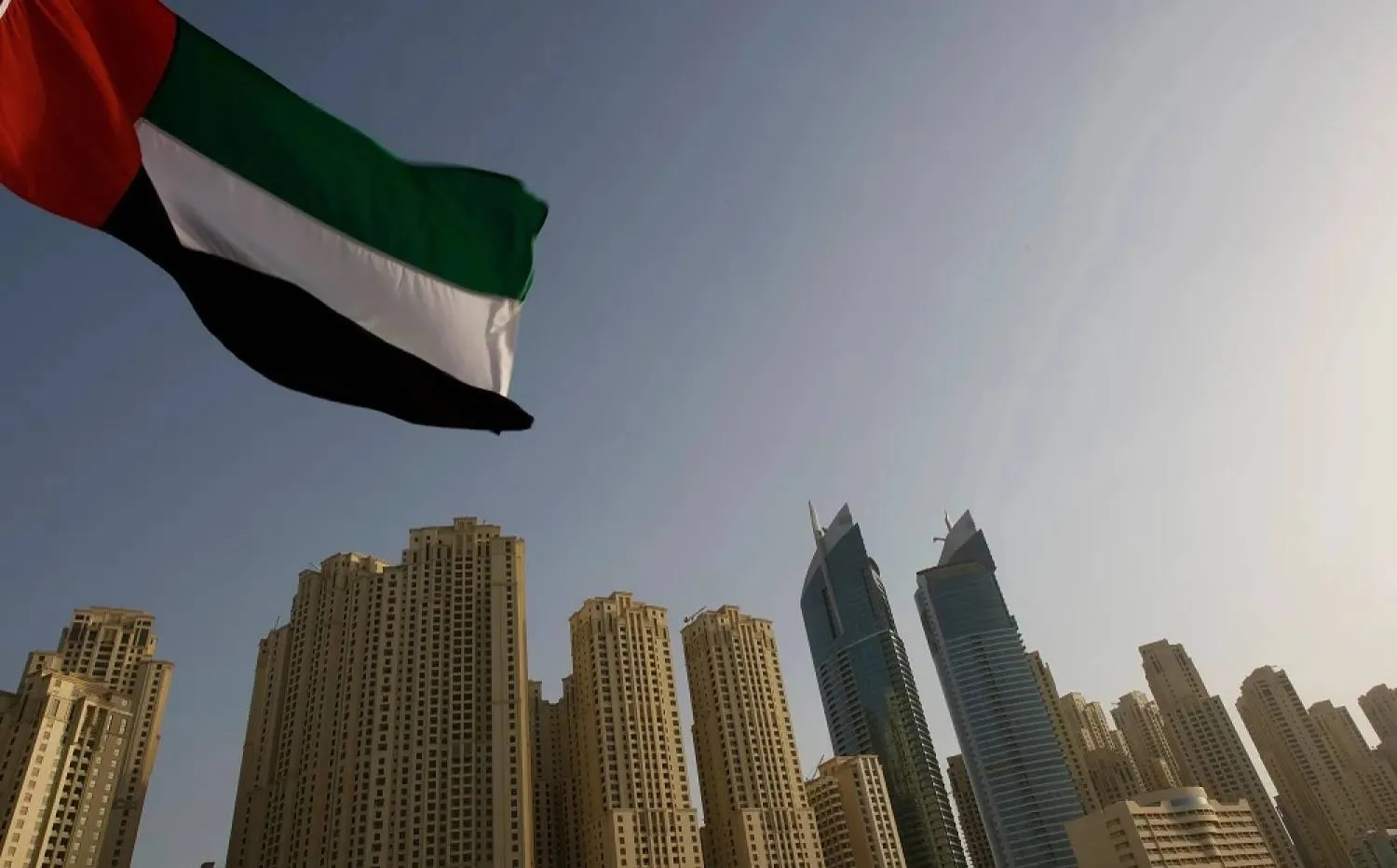  The United Arab Emirates flag flies in front of the Jumeirah Beach Residence in Dubai. (Reuters file photo) 