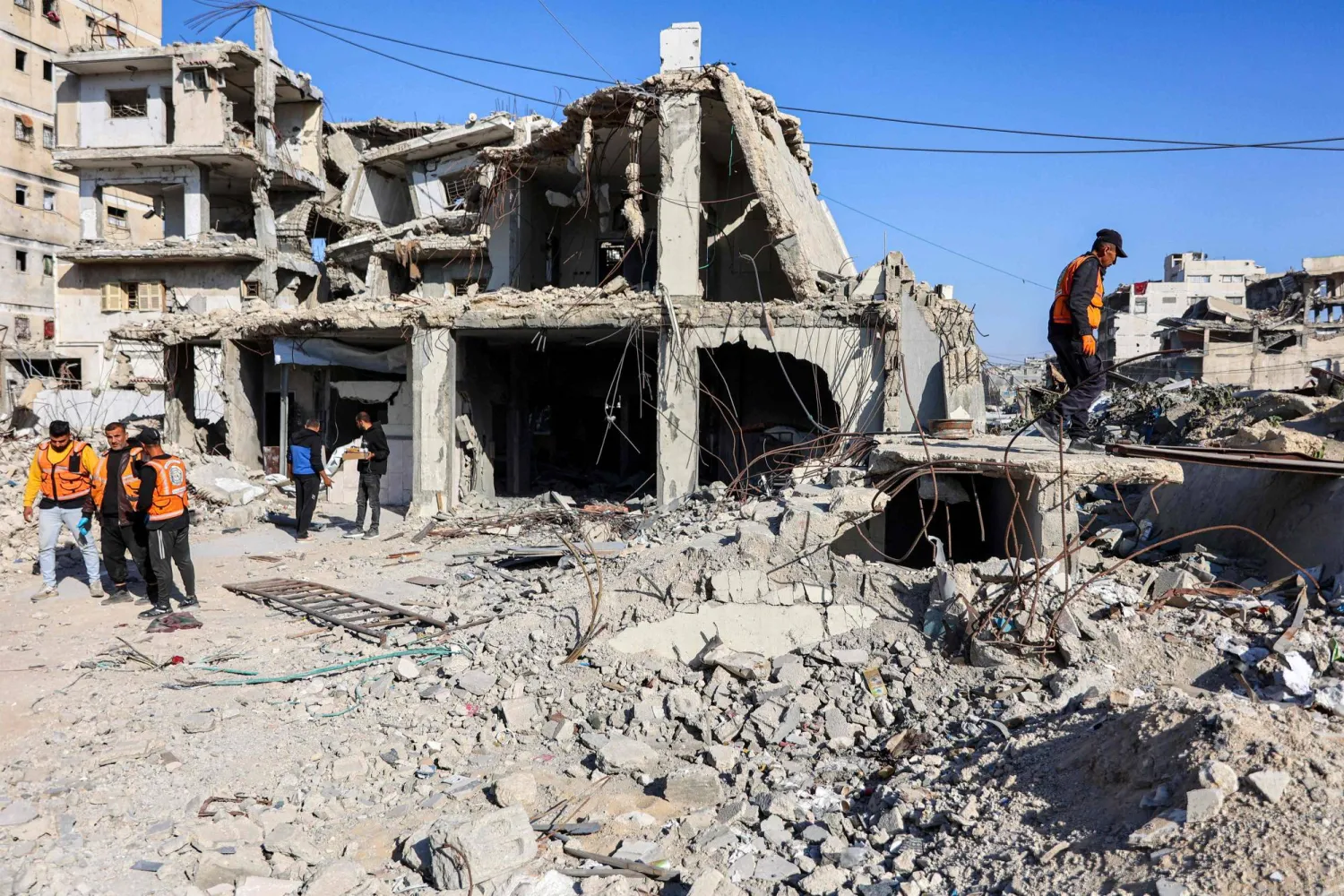 First responders inspect the site of an Israeli strike on a police station in Gaza City on May 5, 2026. (AFP) 