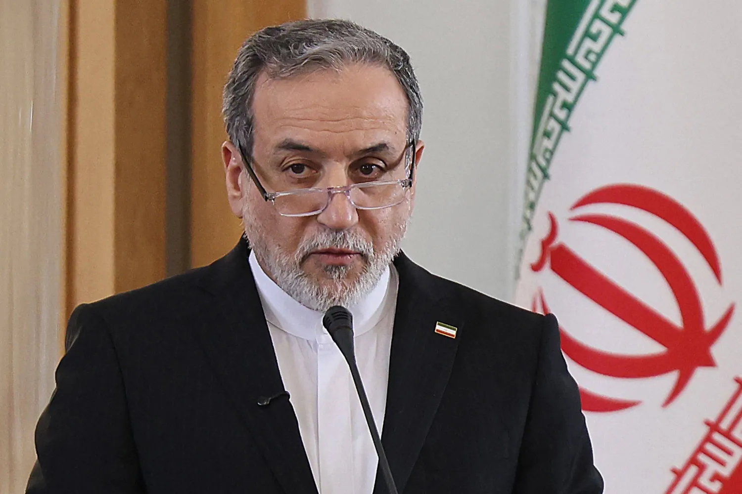(FILES) Iranian Foreign Minister Abbas Araghchi attends a joint press conference with his Iraqi counterpart Fuad Hussein in Tehran on January 18, 2026. (Photo by ATTA KENARE / AFP)