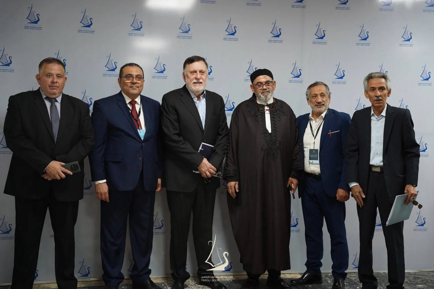 فائز السراج (إلى الوسط) خلال إشهار المجلس الاجتماعي طرابلس الأسبوع الماضي (الصفحة الرسمية للمجلس)