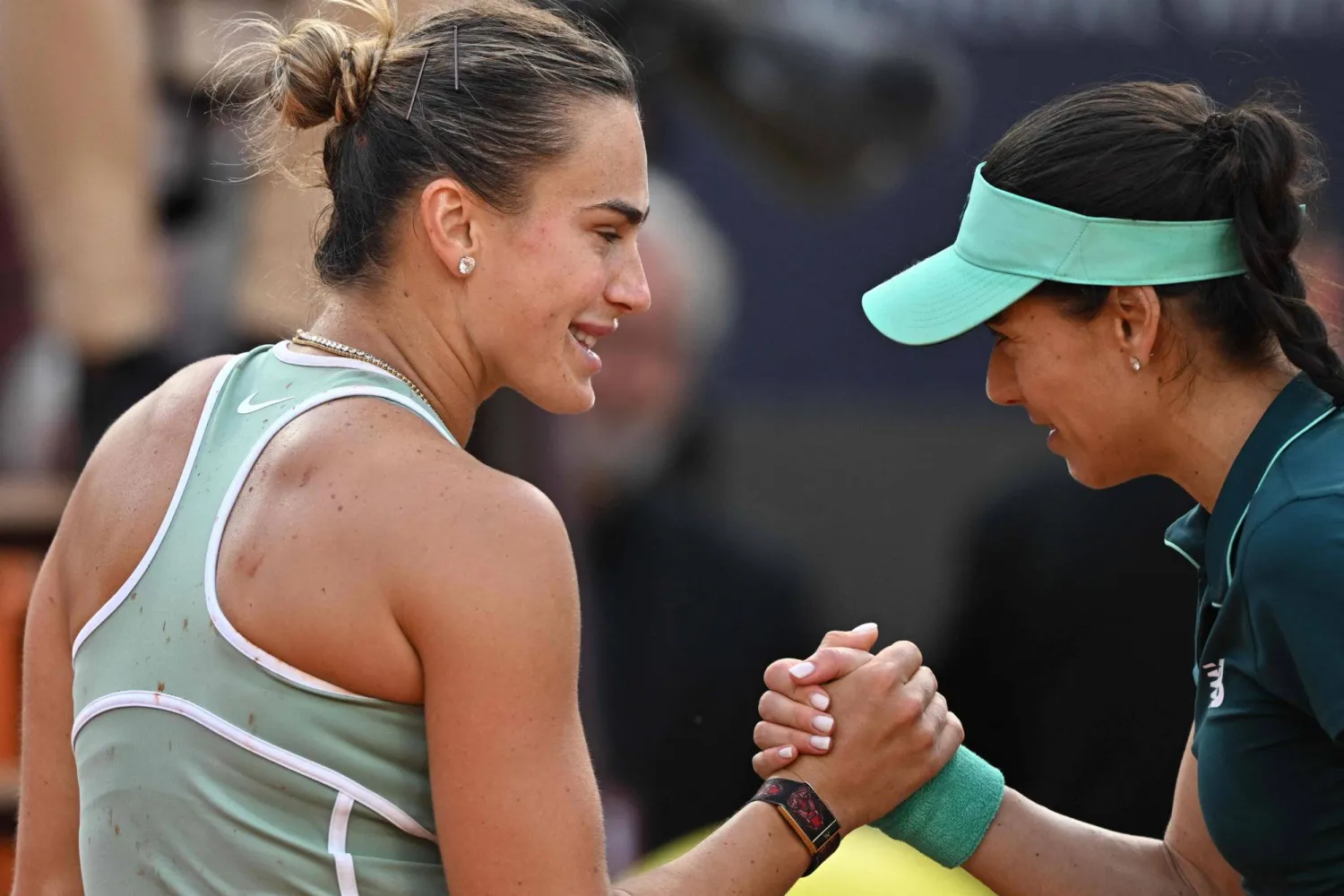 Belarus' Aryna Sabalenka congratulates Romania's Sorana Cirstea after being defeated during the WTA Rome Open tennis tournament at Foro Italico in Rome on May 9, 2026. (Photo by Tiziana FABI / AFP)