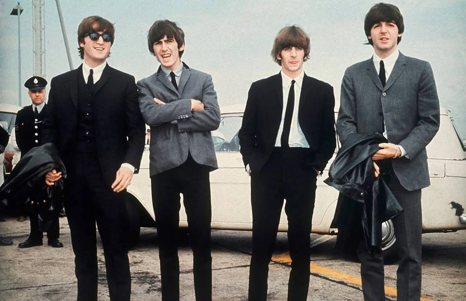 The Beatles, from left, John Lennon, George Harrison, Ringo Starr and Paul McCartney, arrive in Liverpool, England on July 10, 1964, for the premiere of their movie "A Hard Day's Night." (AP) 