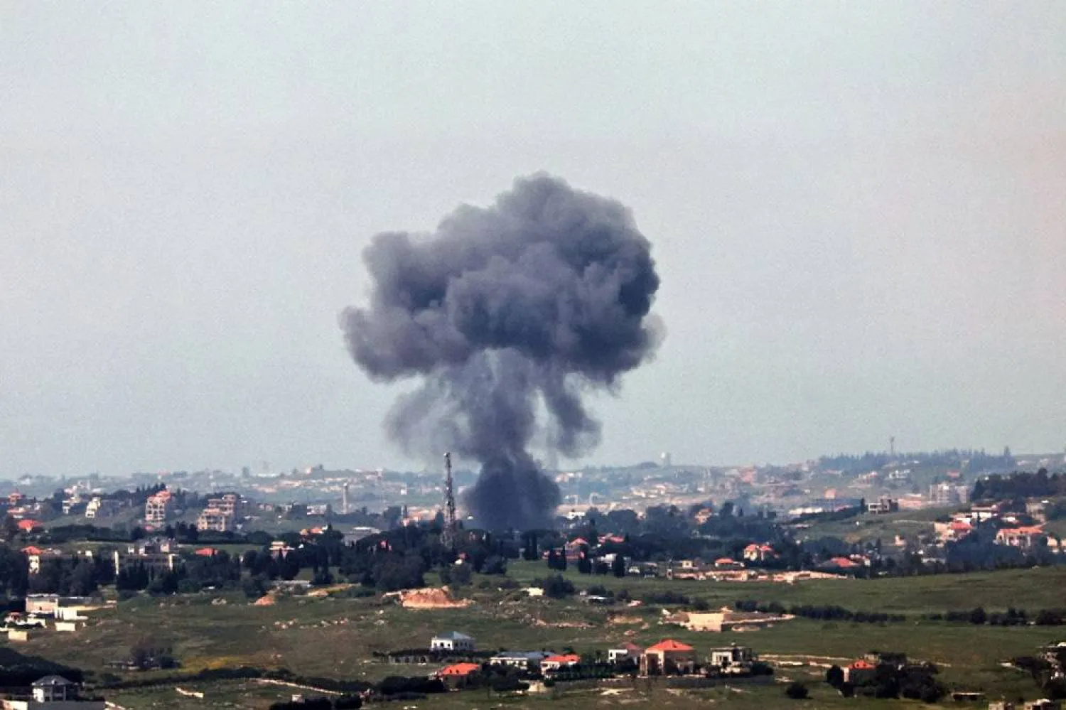 Smoke rises as a result of an Israeli strike on a southern Lebanon village as seen from the Upper Galilee on the Israel-Lebanon border, 11 May 2026. (EPA)