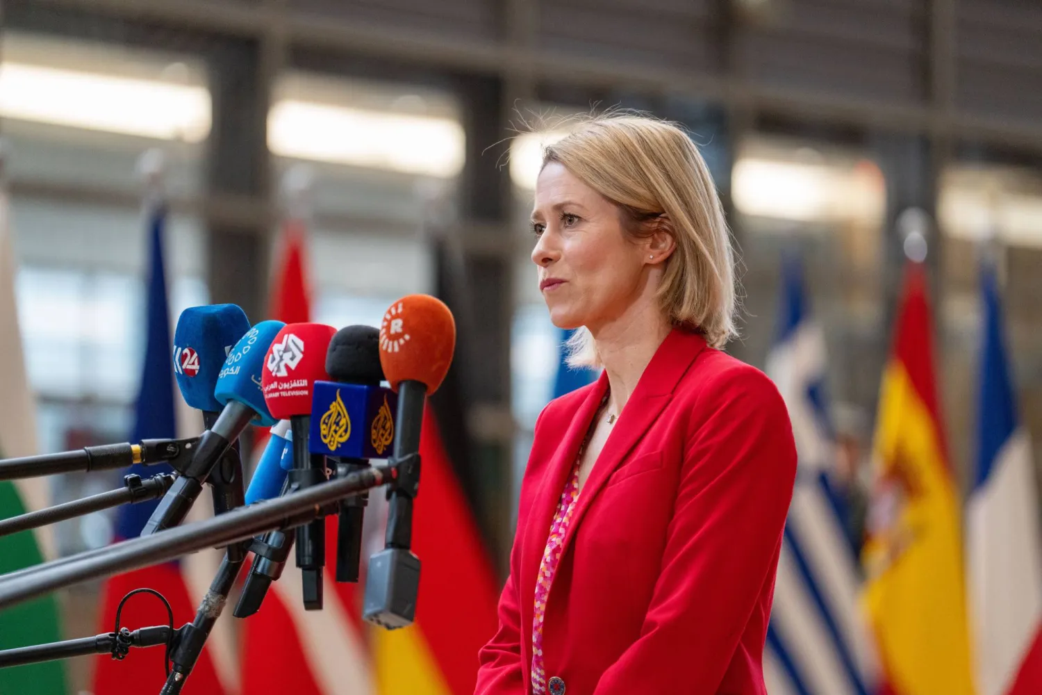 European Union foreign policy chief Kaja Kallas speaks with the media as she arrives for a meeting of EU foreign ministers at the European Council building in Brussels, Monday, May 11, 2026. (AP Photo/Marius Burgelman)