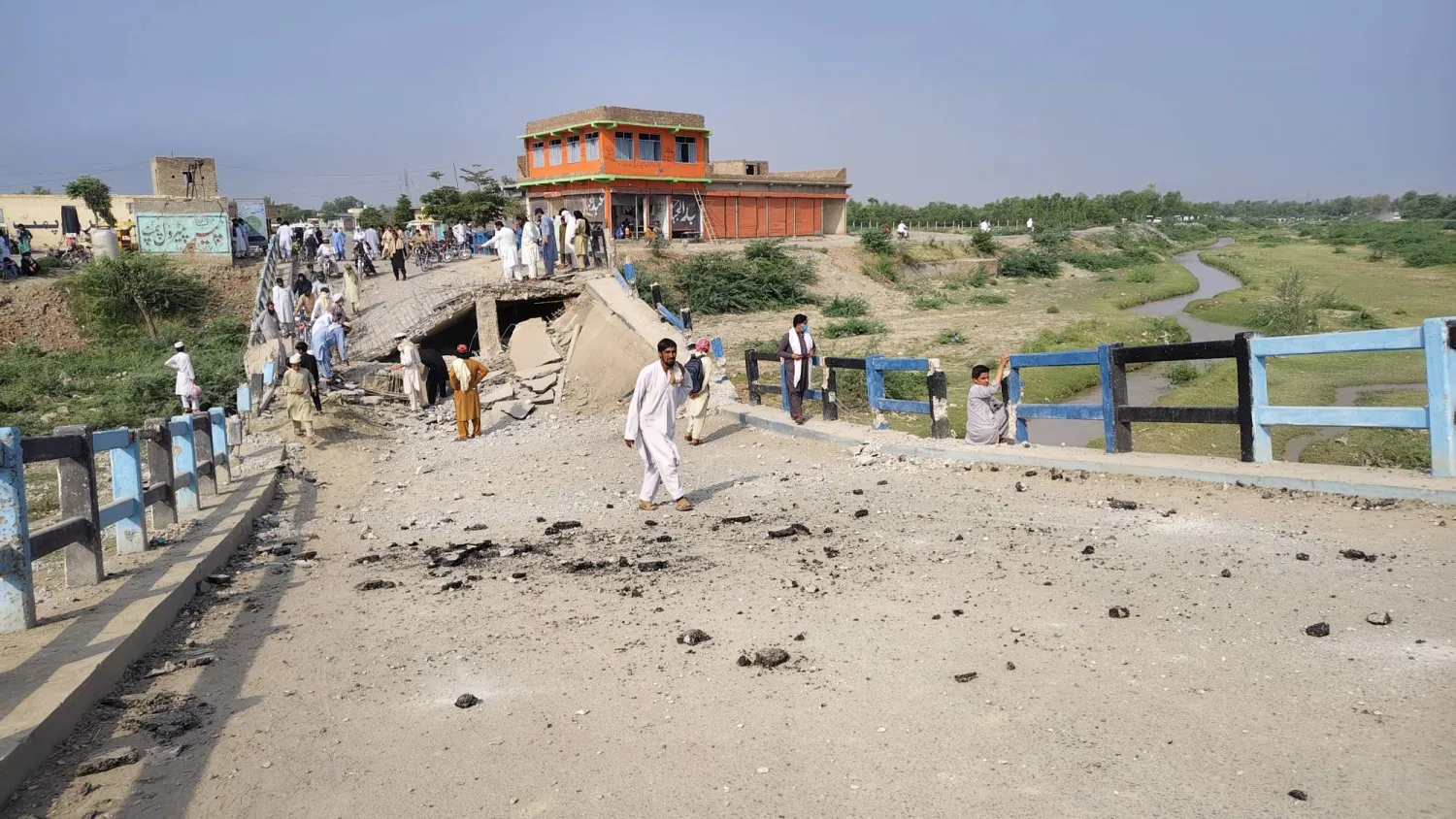 File photo: People survey the Lorha bridge, allegedly destroyed by militants in Bannu, Khyber Pakhtunkhwa (KPK) province, Pakistan, 12 May 2026. EPA/WASEEM KHAN
